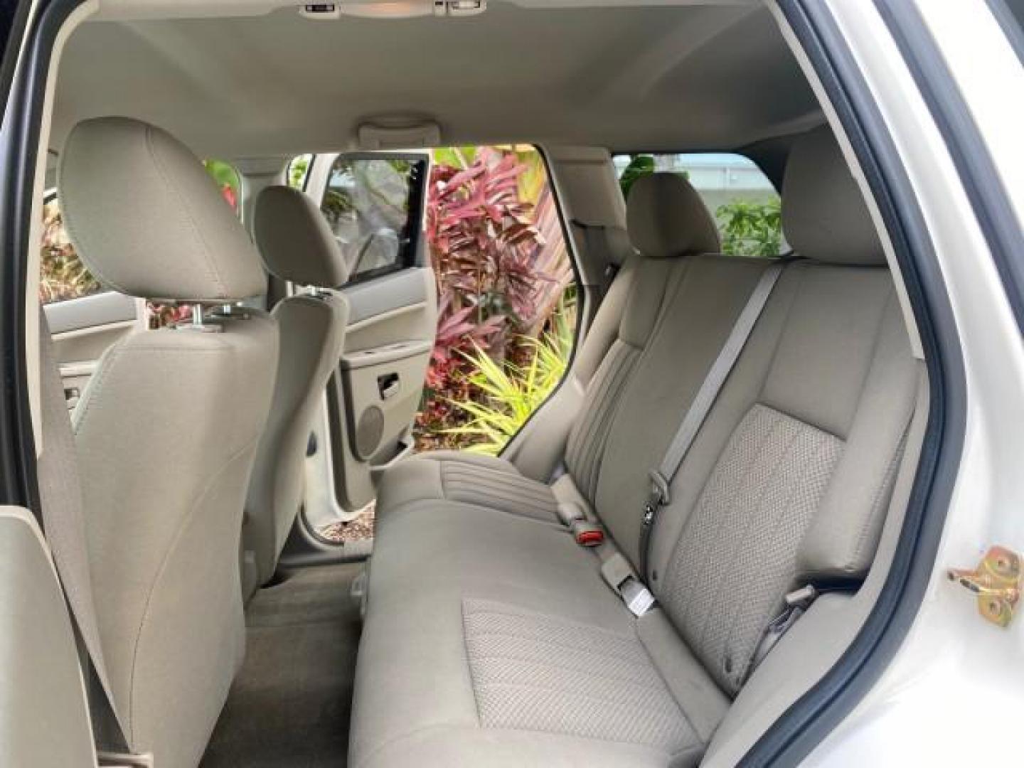 2005 Stone White /Medium Slate Gray Jeep Grand Cherokee Laredo LOW MILES 61,347 (1J4GS48K85C) with an 3.7L V6 Power Tech Engine engine, Automatic transmission, located at 4701 North Dixie Hwy, Pompano Beach, FL, 33064, (954) 422-2889, 26.240938, -80.123474 - OUR WEBPAGE FLORIDACARS1.COM HAS OVER 100 PHOTOS AND FREE CARFAX LINK 2005 JEEP GRAND CHEROKEE LAREDO VIN: 1J4GS48K85C634226 1 J 4 G S 4 8 K 8 5 C 6 3 4 2 2 6 4 DOOR WAGON/SPORT UTILITY 3.7L V6 F GASOLINE REAR WHEEL DRIVE Features ABS Brakes Air Conditioning Alloy Wheels AM/FM Stereo Automatic Trans - Photo#14