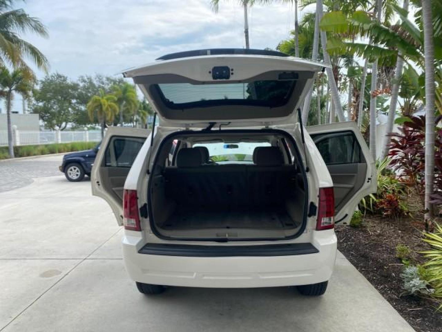 2005 Stone White /Medium Slate Gray Jeep Grand Cherokee Laredo LOW MILES 61,347 (1J4GS48K85C) with an 3.7L V6 Power Tech Engine engine, Automatic transmission, located at 4701 North Dixie Hwy, Pompano Beach, FL, 33064, (954) 422-2889, 26.240938, -80.123474 - OUR WEBPAGE FLORIDACARS1.COM HAS OVER 100 PHOTOS AND FREE CARFAX LINK 2005 JEEP GRAND CHEROKEE LAREDO VIN: 1J4GS48K85C634226 1 J 4 G S 4 8 K 8 5 C 6 3 4 2 2 6 4 DOOR WAGON/SPORT UTILITY 3.7L V6 F GASOLINE REAR WHEEL DRIVE Features ABS Brakes Air Conditioning Alloy Wheels AM/FM Stereo Automatic Trans - Photo#15