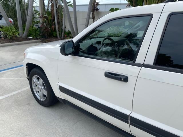 2005 Stone White /Medium Slate Gray Jeep Grand Cherokee Laredo LOW MILES 61,351 (1J4GS48K85C) with an 3.7L V6 Power Tech Engine engine, Automatic transmission, located at 4701 North Dixie Hwy, Pompano Beach, FL, 33064, (954) 422-2889, 26.240938, -80.123474 - OUR WEBPAGE FLORIDACARS1.COM HAS OVER 100 PHOTOS AND FREE CARFAX LINK 2005 JEEP GRAND CHEROKEE LAREDO VIN: 1J4GS48K85C634226 1 J 4 G S 4 8 K 8 5 C 6 3 4 2 2 6 4 DOOR WAGON/SPORT UTILITY 3.7L V6 F GASOLINE REAR WHEEL DRIVE Features ABS Brakes Air Conditioning Alloy Wheels AM/FM Stereo Automatic Trans - Photo#27