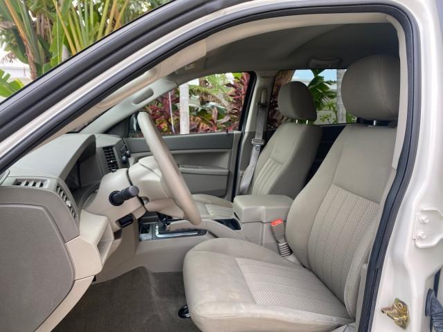 2005 Stone White /Medium Slate Gray Jeep Grand Cherokee Laredo LOW MILES 61,351 (1J4GS48K85C) with an 3.7L V6 Power Tech Engine engine, Automatic transmission, located at 4701 North Dixie Hwy, Pompano Beach, FL, 33064, (954) 422-2889, 26.240938, -80.123474 - OUR WEBPAGE FLORIDACARS1.COM HAS OVER 100 PHOTOS AND FREE CARFAX LINK 2005 JEEP GRAND CHEROKEE LAREDO VIN: 1J4GS48K85C634226 1 J 4 G S 4 8 K 8 5 C 6 3 4 2 2 6 4 DOOR WAGON/SPORT UTILITY 3.7L V6 F GASOLINE REAR WHEEL DRIVE Features ABS Brakes Air Conditioning Alloy Wheels AM/FM Stereo Automatic Trans - Photo#34