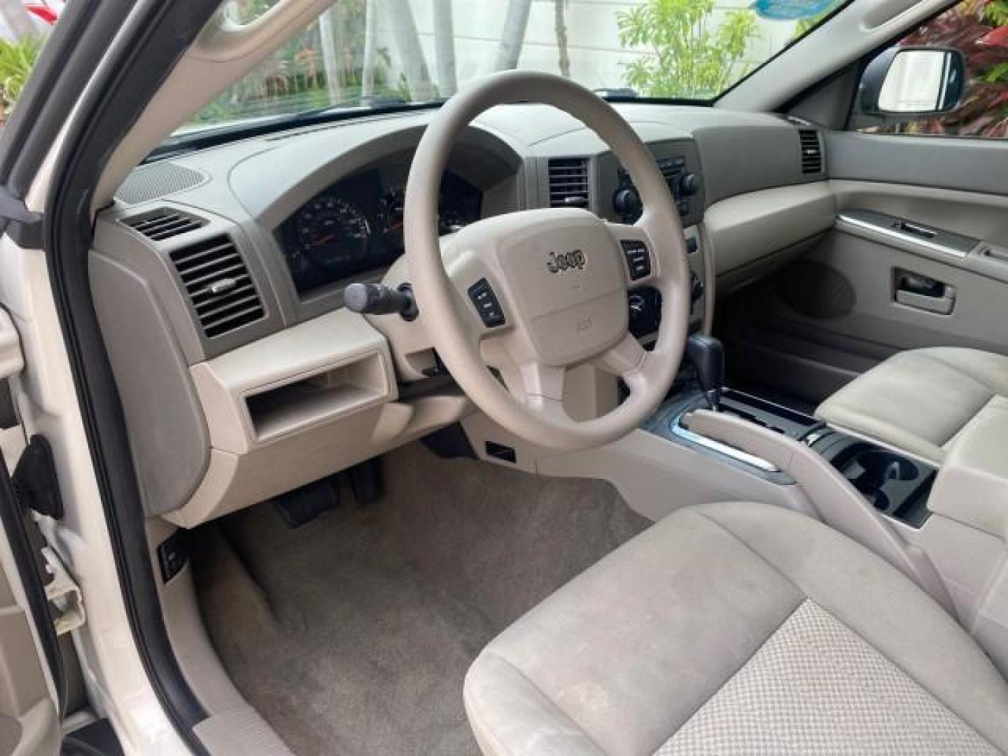 2005 Stone White /Medium Slate Gray Jeep Grand Cherokee Laredo LOW MILES 61,347 (1J4GS48K85C) with an 3.7L V6 Power Tech Engine engine, Automatic transmission, located at 4701 North Dixie Hwy, Pompano Beach, FL, 33064, (954) 422-2889, 26.240938, -80.123474 - OUR WEBPAGE FLORIDACARS1.COM HAS OVER 100 PHOTOS AND FREE CARFAX LINK 2005 JEEP GRAND CHEROKEE LAREDO VIN: 1J4GS48K85C634226 1 J 4 G S 4 8 K 8 5 C 6 3 4 2 2 6 4 DOOR WAGON/SPORT UTILITY 3.7L V6 F GASOLINE REAR WHEEL DRIVE Features ABS Brakes Air Conditioning Alloy Wheels AM/FM Stereo Automatic Trans - Photo#39