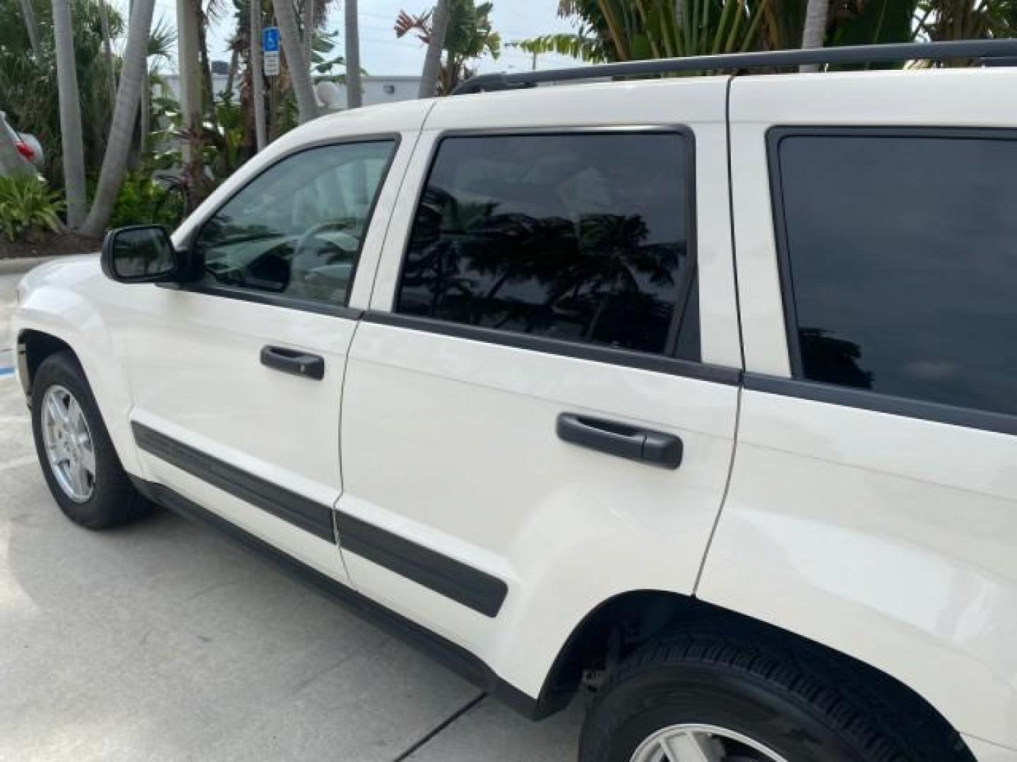 2005 Stone White /Medium Slate Gray Jeep Grand Cherokee Laredo LOW MILES 61,347 (1J4GS48K85C) with an 3.7L V6 Power Tech Engine engine, Automatic transmission, located at 4701 North Dixie Hwy, Pompano Beach, FL, 33064, (954) 422-2889, 26.240938, -80.123474 - OUR WEBPAGE FLORIDACARS1.COM HAS OVER 100 PHOTOS AND FREE CARFAX LINK 2005 JEEP GRAND CHEROKEE LAREDO VIN: 1J4GS48K85C634226 1 J 4 G S 4 8 K 8 5 C 6 3 4 2 2 6 4 DOOR WAGON/SPORT UTILITY 3.7L V6 F GASOLINE REAR WHEEL DRIVE Features ABS Brakes Air Conditioning Alloy Wheels AM/FM Stereo Automatic Trans - Photo#61