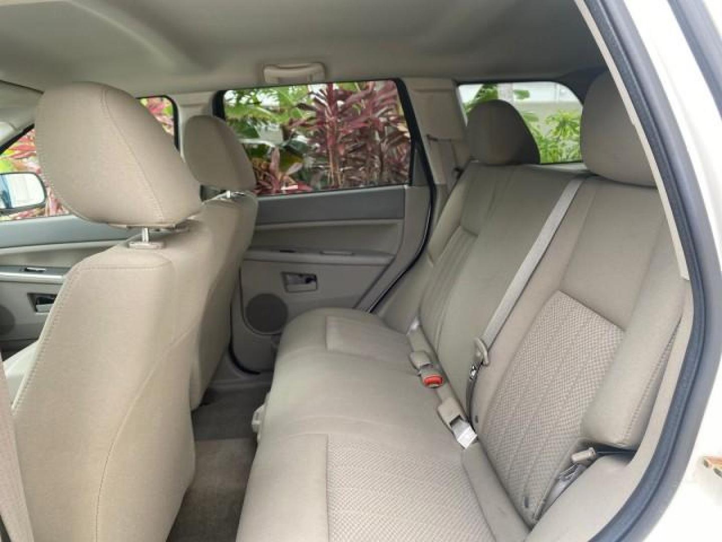 2005 Stone White /Medium Slate Gray Jeep Grand Cherokee Laredo LOW MILES 61,347 (1J4GS48K85C) with an 3.7L V6 Power Tech Engine engine, Automatic transmission, located at 4701 North Dixie Hwy, Pompano Beach, FL, 33064, (954) 422-2889, 26.240938, -80.123474 - OUR WEBPAGE FLORIDACARS1.COM HAS OVER 100 PHOTOS AND FREE CARFAX LINK 2005 JEEP GRAND CHEROKEE LAREDO VIN: 1J4GS48K85C634226 1 J 4 G S 4 8 K 8 5 C 6 3 4 2 2 6 4 DOOR WAGON/SPORT UTILITY 3.7L V6 F GASOLINE REAR WHEEL DRIVE Features ABS Brakes Air Conditioning Alloy Wheels AM/FM Stereo Automatic Trans - Photo#65