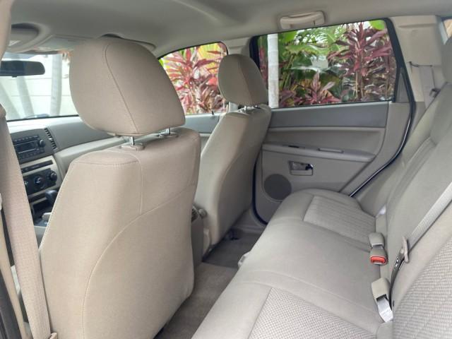 2005 Stone White /Medium Slate Gray Jeep Grand Cherokee Laredo LOW MILES 61,351 (1J4GS48K85C) with an 3.7L V6 Power Tech Engine engine, Automatic transmission, located at 4701 North Dixie Hwy, Pompano Beach, FL, 33064, (954) 422-2889, 26.240938, -80.123474 - OUR WEBPAGE FLORIDACARS1.COM HAS OVER 100 PHOTOS AND FREE CARFAX LINK 2005 JEEP GRAND CHEROKEE LAREDO VIN: 1J4GS48K85C634226 1 J 4 G S 4 8 K 8 5 C 6 3 4 2 2 6 4 DOOR WAGON/SPORT UTILITY 3.7L V6 F GASOLINE REAR WHEEL DRIVE Features ABS Brakes Air Conditioning Alloy Wheels AM/FM Stereo Automatic Trans - Photo#67