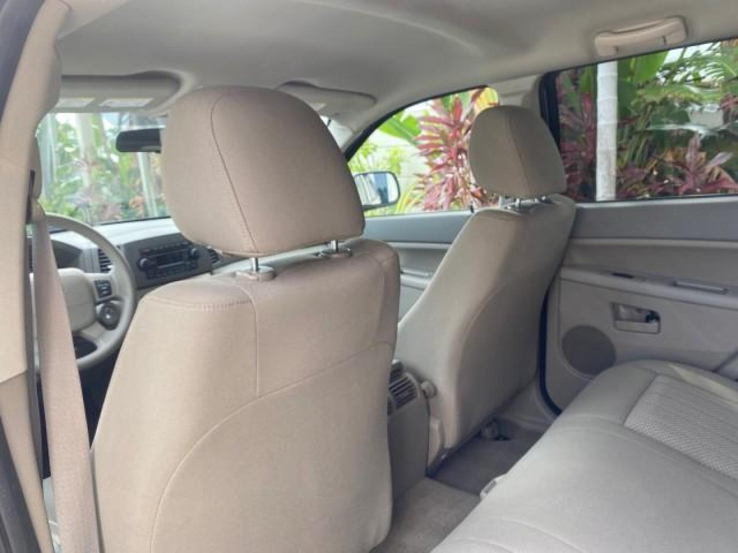 2005 Stone White /Medium Slate Gray Jeep Grand Cherokee Laredo LOW MILES 61,347 (1J4GS48K85C) with an 3.7L V6 Power Tech Engine engine, Automatic transmission, located at 4701 North Dixie Hwy, Pompano Beach, FL, 33064, (954) 422-2889, 26.240938, -80.123474 - OUR WEBPAGE FLORIDACARS1.COM HAS OVER 100 PHOTOS AND FREE CARFAX LINK 2005 JEEP GRAND CHEROKEE LAREDO VIN: 1J4GS48K85C634226 1 J 4 G S 4 8 K 8 5 C 6 3 4 2 2 6 4 DOOR WAGON/SPORT UTILITY 3.7L V6 F GASOLINE REAR WHEEL DRIVE Features ABS Brakes Air Conditioning Alloy Wheels AM/FM Stereo Automatic Trans - Photo#69