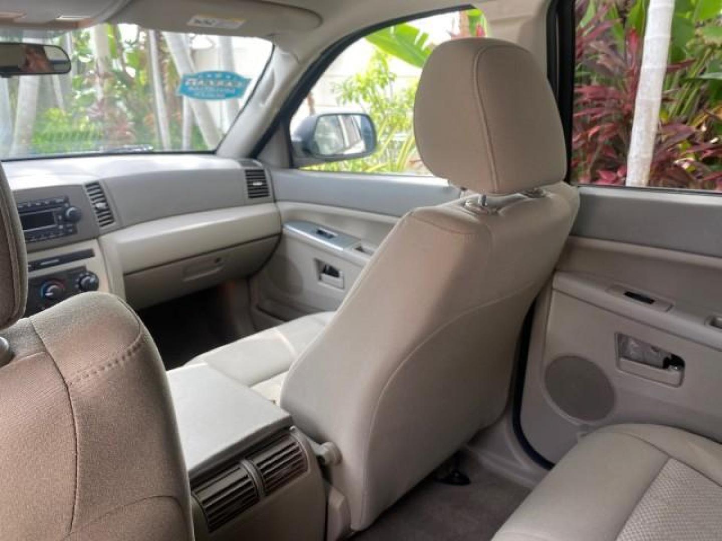 2005 Stone White /Medium Slate Gray Jeep Grand Cherokee Laredo LOW MILES 61,347 (1J4GS48K85C) with an 3.7L V6 Power Tech Engine engine, Automatic transmission, located at 4701 North Dixie Hwy, Pompano Beach, FL, 33064, (954) 422-2889, 26.240938, -80.123474 - OUR WEBPAGE FLORIDACARS1.COM HAS OVER 100 PHOTOS AND FREE CARFAX LINK 2005 JEEP GRAND CHEROKEE LAREDO VIN: 1J4GS48K85C634226 1 J 4 G S 4 8 K 8 5 C 6 3 4 2 2 6 4 DOOR WAGON/SPORT UTILITY 3.7L V6 F GASOLINE REAR WHEEL DRIVE Features ABS Brakes Air Conditioning Alloy Wheels AM/FM Stereo Automatic Trans - Photo#73