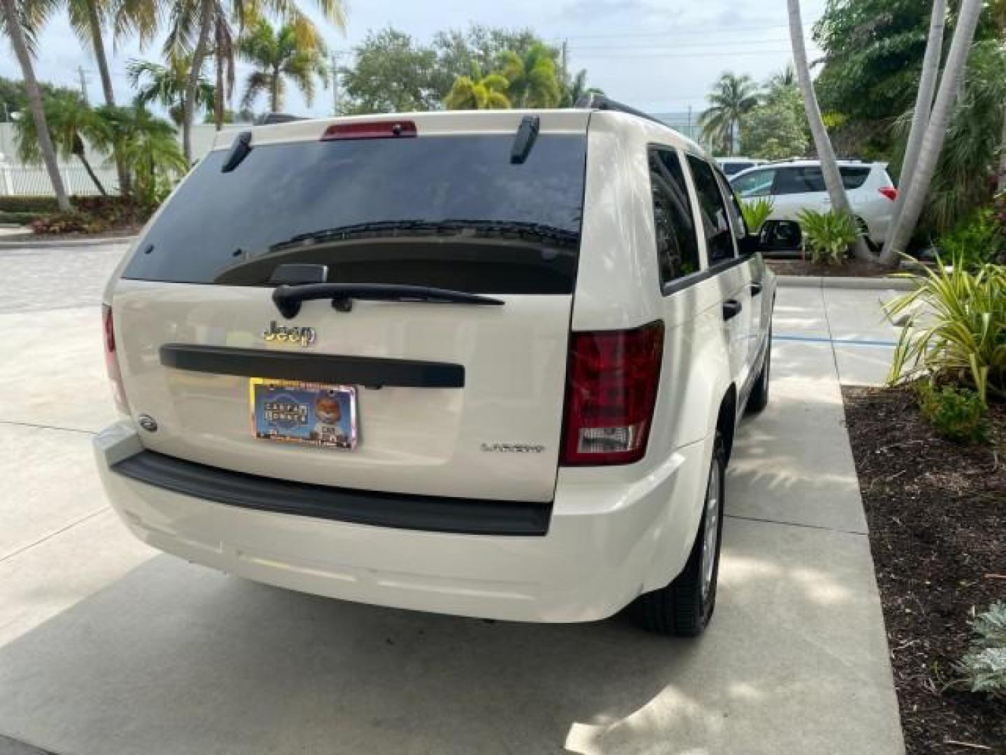 2005 Stone White /Medium Slate Gray Jeep Grand Cherokee Laredo LOW MILES 61,347 (1J4GS48K85C) with an 3.7L V6 Power Tech Engine engine, Automatic transmission, located at 4701 North Dixie Hwy, Pompano Beach, FL, 33064, (954) 422-2889, 26.240938, -80.123474 - OUR WEBPAGE FLORIDACARS1.COM HAS OVER 100 PHOTOS AND FREE CARFAX LINK 2005 JEEP GRAND CHEROKEE LAREDO VIN: 1J4GS48K85C634226 1 J 4 G S 4 8 K 8 5 C 6 3 4 2 2 6 4 DOOR WAGON/SPORT UTILITY 3.7L V6 F GASOLINE REAR WHEEL DRIVE Features ABS Brakes Air Conditioning Alloy Wheels AM/FM Stereo Automatic Trans - Photo#80