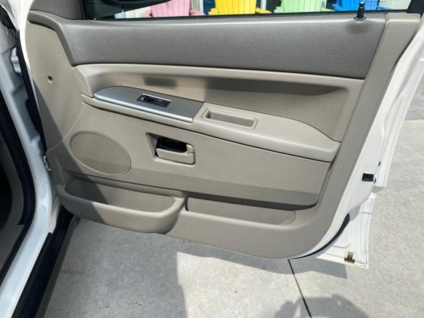 2005 Stone White /Medium Slate Gray Jeep Grand Cherokee Laredo LOW MILES 61,347 (1J4GS48K85C) with an 3.7L V6 Power Tech Engine engine, Automatic transmission, located at 4701 North Dixie Hwy, Pompano Beach, FL, 33064, (954) 422-2889, 26.240938, -80.123474 - OUR WEBPAGE FLORIDACARS1.COM HAS OVER 100 PHOTOS AND FREE CARFAX LINK 2005 JEEP GRAND CHEROKEE LAREDO VIN: 1J4GS48K85C634226 1 J 4 G S 4 8 K 8 5 C 6 3 4 2 2 6 4 DOOR WAGON/SPORT UTILITY 3.7L V6 F GASOLINE REAR WHEEL DRIVE Features ABS Brakes Air Conditioning Alloy Wheels AM/FM Stereo Automatic Trans - Photo#96