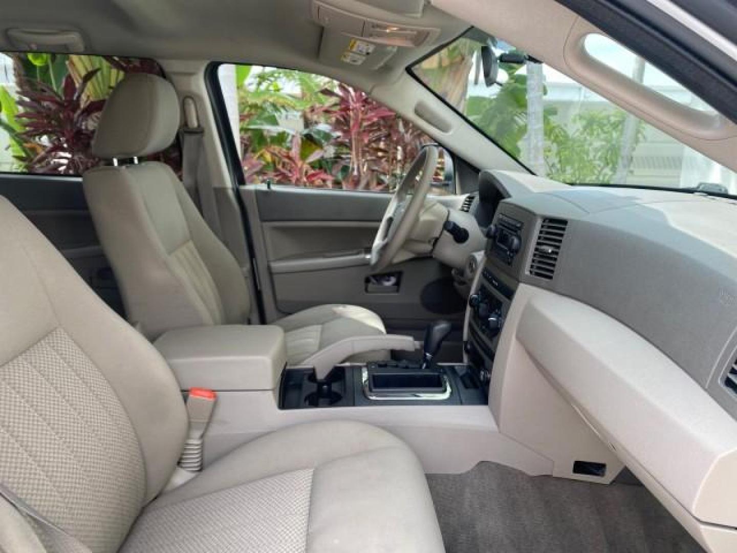 2005 Stone White /Medium Slate Gray Jeep Grand Cherokee Laredo LOW MILES 61,347 (1J4GS48K85C) with an 3.7L V6 Power Tech Engine engine, Automatic transmission, located at 4701 North Dixie Hwy, Pompano Beach, FL, 33064, (954) 422-2889, 26.240938, -80.123474 - OUR WEBPAGE FLORIDACARS1.COM HAS OVER 100 PHOTOS AND FREE CARFAX LINK 2005 JEEP GRAND CHEROKEE LAREDO VIN: 1J4GS48K85C634226 1 J 4 G S 4 8 K 8 5 C 6 3 4 2 2 6 4 DOOR WAGON/SPORT UTILITY 3.7L V6 F GASOLINE REAR WHEEL DRIVE Features ABS Brakes Air Conditioning Alloy Wheels AM/FM Stereo Automatic Trans - Photo#99