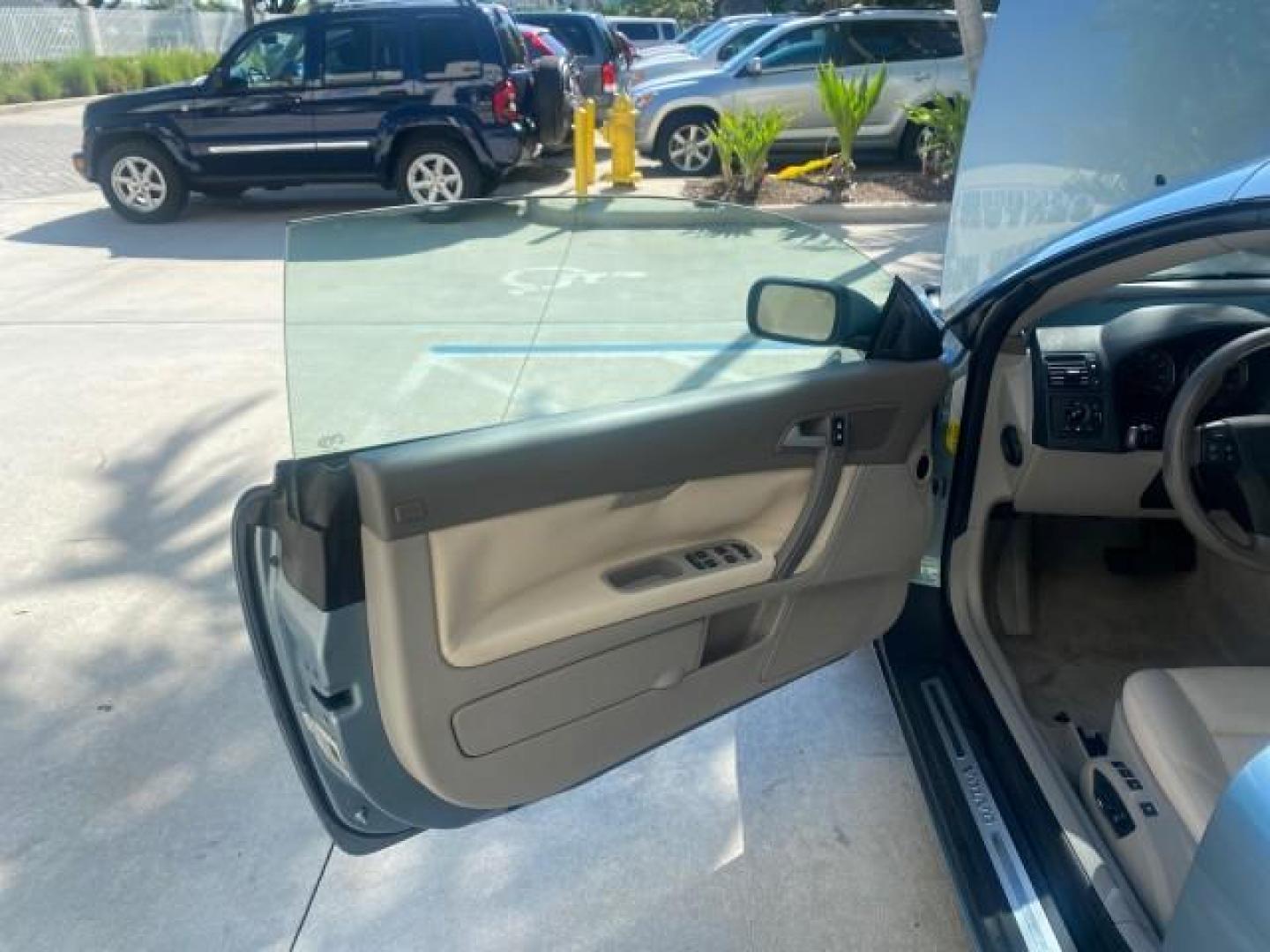 2006 Celestial Blue Metallic /Calcite Cream Volvo C70 LOW MILES 16,982 CONV (YV1MC68276J) with an 2.5L DOHC Turbocharged I5 Engine engine, Automatic transmission, located at 4701 North Dixie Hwy, Pompano Beach, FL, 33064, (954) 422-2889, 26.240938, -80.123474 - OUR WEBPAGE FLORIDACARS1.COM HAS OVER 100 PHOTOS AND FREE CARFAX LINK 2006 VOLVO C70 T5 ORIGINAL PRICE NEW : $41,510 VIN: YV1MC68276J006425 Y V 1 M C 6 8 2 7 6 J 0 0 6 4 2 5 CONVERTIBLE 2.5L I5 F GASOLINE FRONT WHEEL DRIVE Features ABS Brakes Air Conditioning Alloy Wheels AM/FM Stereo Automatic Tran - Photo#9
