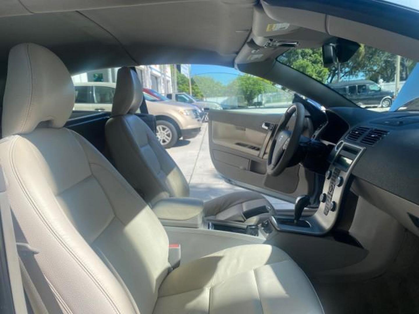 2006 Celestial Blue Metallic /Calcite Cream Volvo C70 LOW MILES 16,982 CONV (YV1MC68276J) with an 2.5L DOHC Turbocharged I5 Engine engine, Automatic transmission, located at 4701 North Dixie Hwy, Pompano Beach, FL, 33064, (954) 422-2889, 26.240938, -80.123474 - OUR WEBPAGE FLORIDACARS1.COM HAS OVER 100 PHOTOS AND FREE CARFAX LINK 2006 VOLVO C70 T5 ORIGINAL PRICE NEW : $41,510 VIN: YV1MC68276J006425 Y V 1 M C 6 8 2 7 6 J 0 0 6 4 2 5 CONVERTIBLE 2.5L I5 F GASOLINE FRONT WHEEL DRIVE Features ABS Brakes Air Conditioning Alloy Wheels AM/FM Stereo Automatic Tran - Photo#12