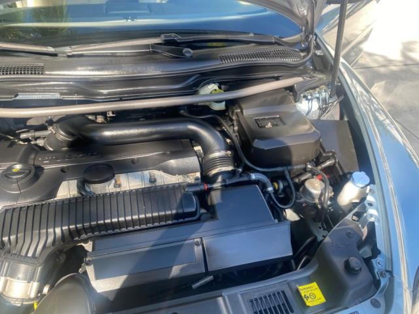 2006 Celestial Blue Metallic /Calcite Cream Volvo C70 LOW MILES 16,982 CONV (YV1MC68276J) with an 2.5L DOHC Turbocharged I5 Engine engine, Automatic transmission, located at 4701 North Dixie Hwy, Pompano Beach, FL, 33064, (954) 422-2889, 26.240938, -80.123474 - OUR WEBPAGE FLORIDACARS1.COM HAS OVER 100 PHOTOS AND FREE CARFAX LINK 2006 VOLVO C70 T5 ORIGINAL PRICE NEW : $41,510 VIN: YV1MC68276J006425 Y V 1 M C 6 8 2 7 6 J 0 0 6 4 2 5 CONVERTIBLE 2.5L I5 F GASOLINE FRONT WHEEL DRIVE Features ABS Brakes Air Conditioning Alloy Wheels AM/FM Stereo Automatic Tran - Photo#25