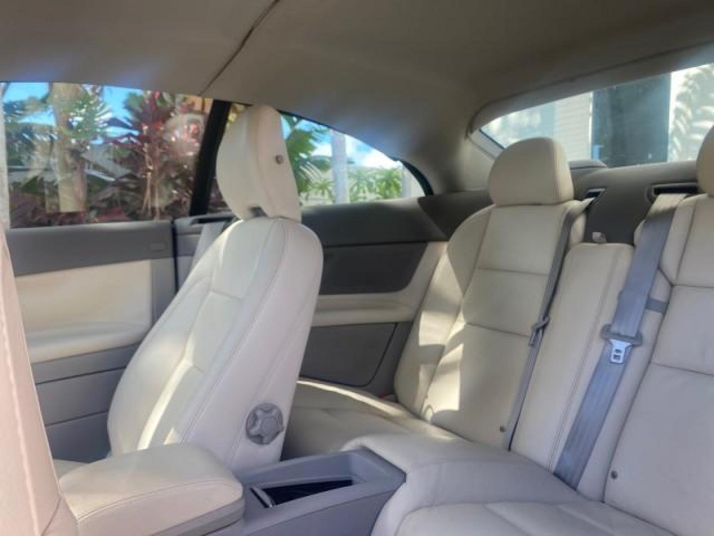 2006 Celestial Blue Metallic /Calcite Cream Volvo C70 LOW MILES 16,982 CONV (YV1MC68276J) with an 2.5L DOHC Turbocharged I5 Engine engine, Automatic transmission, located at 4701 North Dixie Hwy, Pompano Beach, FL, 33064, (954) 422-2889, 26.240938, -80.123474 - OUR WEBPAGE FLORIDACARS1.COM HAS OVER 100 PHOTOS AND FREE CARFAX LINK 2006 VOLVO C70 T5 ORIGINAL PRICE NEW : $41,510 VIN: YV1MC68276J006425 Y V 1 M C 6 8 2 7 6 J 0 0 6 4 2 5 CONVERTIBLE 2.5L I5 F GASOLINE FRONT WHEEL DRIVE Features ABS Brakes Air Conditioning Alloy Wheels AM/FM Stereo Automatic Tran - Photo#68