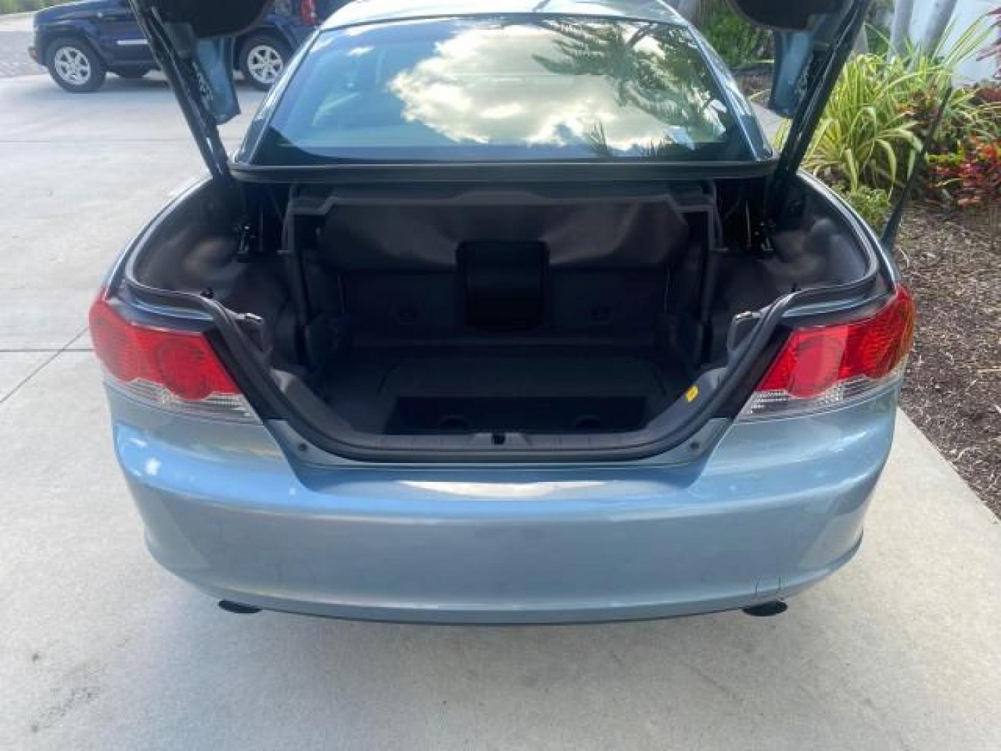 2006 Celestial Blue Metallic /Calcite Cream Volvo C70 LOW MILES 16,982 CONV (YV1MC68276J) with an 2.5L DOHC Turbocharged I5 Engine engine, Automatic transmission, located at 4701 North Dixie Hwy, Pompano Beach, FL, 33064, (954) 422-2889, 26.240938, -80.123474 - OUR WEBPAGE FLORIDACARS1.COM HAS OVER 100 PHOTOS AND FREE CARFAX LINK 2006 VOLVO C70 T5 ORIGINAL PRICE NEW : $41,510 VIN: YV1MC68276J006425 Y V 1 M C 6 8 2 7 6 J 0 0 6 4 2 5 CONVERTIBLE 2.5L I5 F GASOLINE FRONT WHEEL DRIVE Features ABS Brakes Air Conditioning Alloy Wheels AM/FM Stereo Automatic Tran - Photo#81