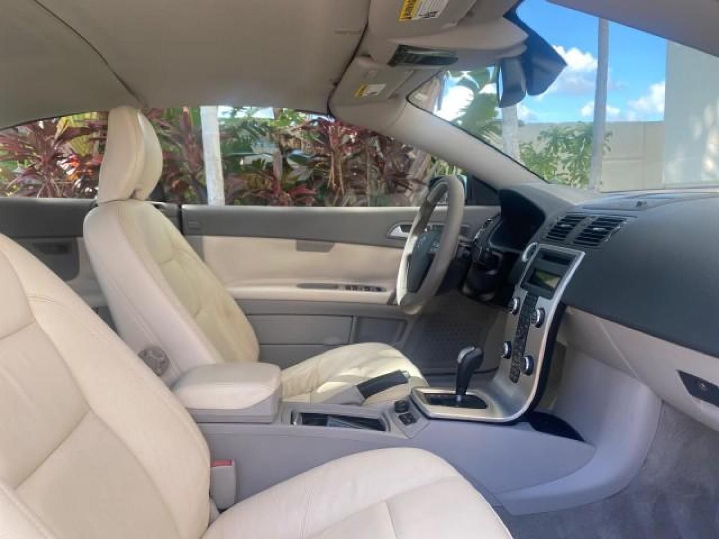 2006 Celestial Blue Metallic /Calcite Cream Volvo C70 LOW MILES 16,982 CONV (YV1MC68276J) with an 2.5L DOHC Turbocharged I5 Engine engine, Automatic transmission, located at 4701 North Dixie Hwy, Pompano Beach, FL, 33064, (954) 422-2889, 26.240938, -80.123474 - OUR WEBPAGE FLORIDACARS1.COM HAS OVER 100 PHOTOS AND FREE CARFAX LINK 2006 VOLVO C70 T5 ORIGINAL PRICE NEW : $41,510 VIN: YV1MC68276J006425 Y V 1 M C 6 8 2 7 6 J 0 0 6 4 2 5 CONVERTIBLE 2.5L I5 F GASOLINE FRONT WHEEL DRIVE Features ABS Brakes Air Conditioning Alloy Wheels AM/FM Stereo Automatic Tran - Photo#98