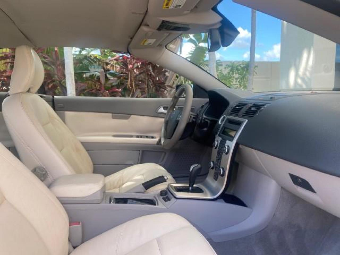 2006 Celestial Blue Metallic /Calcite Cream Volvo C70 LOW MILES 16,982 CONV (YV1MC68276J) with an 2.5L DOHC Turbocharged I5 Engine engine, Automatic transmission, located at 4701 North Dixie Hwy, Pompano Beach, FL, 33064, (954) 422-2889, 26.240938, -80.123474 - OUR WEBPAGE FLORIDACARS1.COM HAS OVER 100 PHOTOS AND FREE CARFAX LINK 2006 VOLVO C70 T5 ORIGINAL PRICE NEW : $41,510 VIN: YV1MC68276J006425 Y V 1 M C 6 8 2 7 6 J 0 0 6 4 2 5 CONVERTIBLE 2.5L I5 F GASOLINE FRONT WHEEL DRIVE Features ABS Brakes Air Conditioning Alloy Wheels AM/FM Stereo Automatic Tran - Photo#99