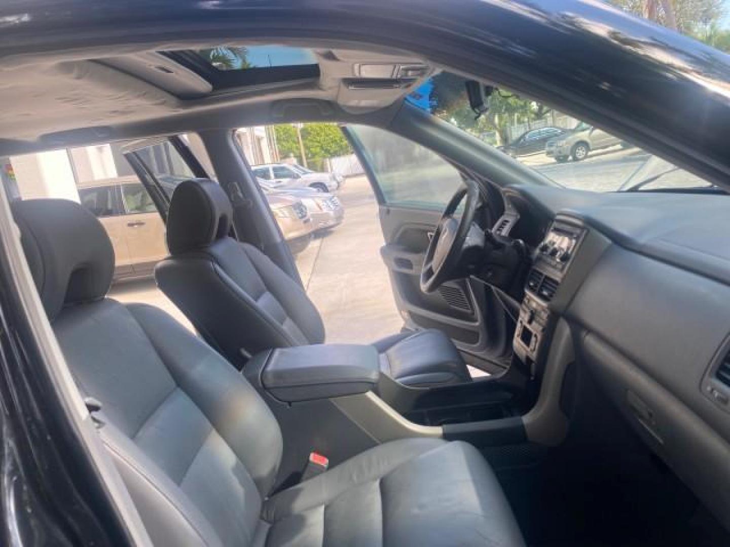 2008 Formal Black /Gray Honda Pilot EX-L 1 OWNER FL LOW-MILES 75,390 (5FNYF28548B) with an 3.5L SOHC MPFI 24-Valve i-VTEC V6 Engine engine, Automatic transmission, located at 4701 North Dixie Hwy, Pompano Beach, FL, 33064, (954) 422-2889, 26.240938, -80.123474 - OUR WEBPAGE FLORIDACARS1.COM HAS OVER 100 PHOTOS AND FREE CARFAX LINK 2008 HONDA PILOT EX-L VIN: 5FNYF28548B019659 5 F N Y F 2 8 5 4 8 B 0 1 9 6 5 9 4 DOOR WAGON/SPORT UTILITY 3.5L V6 F SOHC 24V GASOLINE FRONT WHEEL DRIVE Features ABS Brakes Air Conditioning Alloy Wheels AM/FM Stereo Automatic Trans - Photo#12