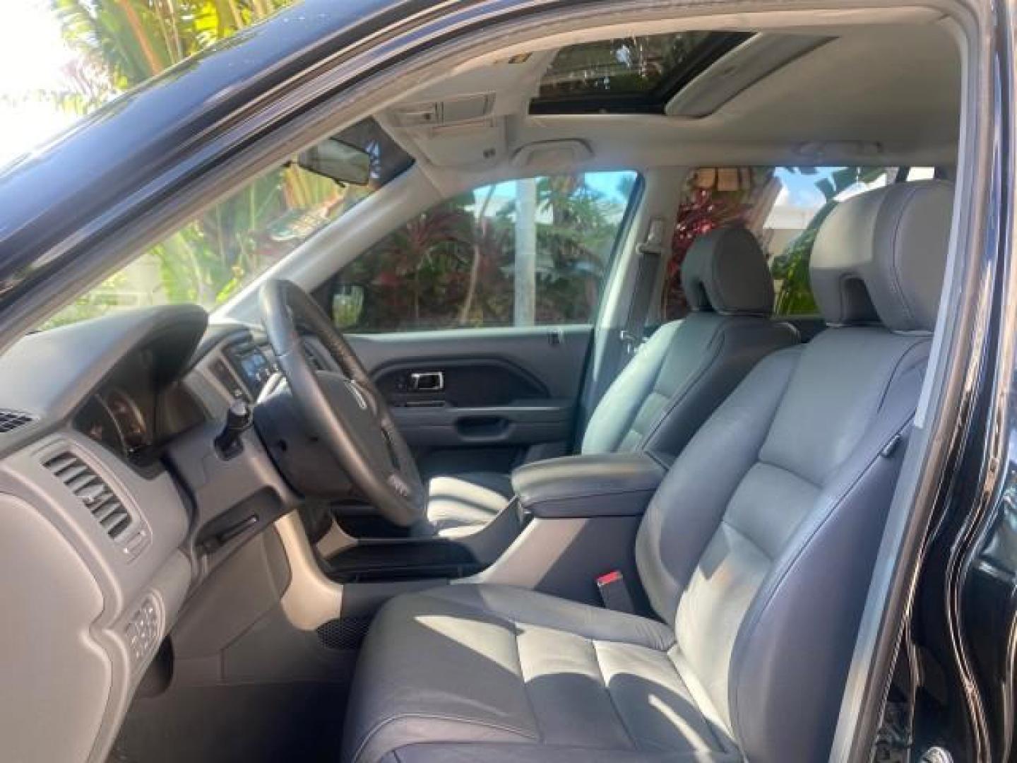2008 Formal Black /Gray Honda Pilot EX-L 1 OWNER FL LOW-MILES 75,390 (5FNYF28548B) with an 3.5L SOHC MPFI 24-Valve i-VTEC V6 Engine engine, Automatic transmission, located at 4701 North Dixie Hwy, Pompano Beach, FL, 33064, (954) 422-2889, 26.240938, -80.123474 - OUR WEBPAGE FLORIDACARS1.COM HAS OVER 100 PHOTOS AND FREE CARFAX LINK 2008 HONDA PILOT EX-L VIN: 5FNYF28548B019659 5 F N Y F 2 8 5 4 8 B 0 1 9 6 5 9 4 DOOR WAGON/SPORT UTILITY 3.5L V6 F SOHC 24V GASOLINE FRONT WHEEL DRIVE Features ABS Brakes Air Conditioning Alloy Wheels AM/FM Stereo Automatic Trans - Photo#33