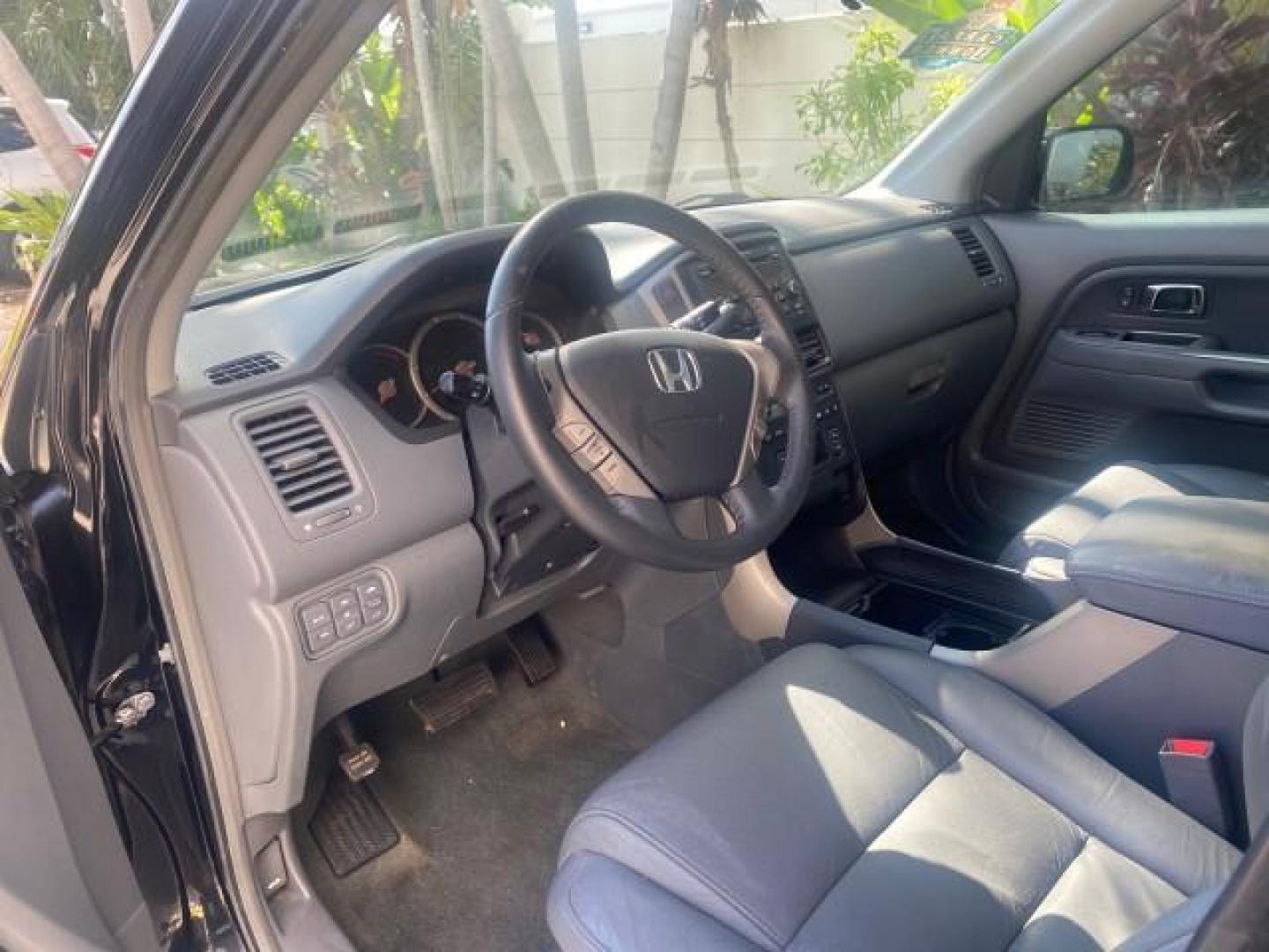 2008 Formal Black /Gray Honda Pilot EX-L 1 OWNER FL LOW-MILES 75,390 (5FNYF28548B) with an 3.5L SOHC MPFI 24-Valve i-VTEC V6 Engine engine, Automatic transmission, located at 4701 North Dixie Hwy, Pompano Beach, FL, 33064, (954) 422-2889, 26.240938, -80.123474 - OUR WEBPAGE FLORIDACARS1.COM HAS OVER 100 PHOTOS AND FREE CARFAX LINK 2008 HONDA PILOT EX-L VIN: 5FNYF28548B019659 5 F N Y F 2 8 5 4 8 B 0 1 9 6 5 9 4 DOOR WAGON/SPORT UTILITY 3.5L V6 F SOHC 24V GASOLINE FRONT WHEEL DRIVE Features ABS Brakes Air Conditioning Alloy Wheels AM/FM Stereo Automatic Trans - Photo#38
