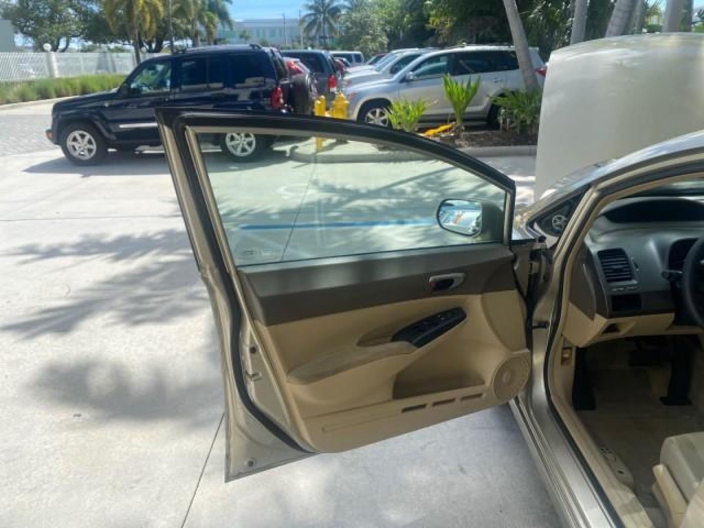 2008 Borrego Beige Metallic /Gray Honda Civic Sdn LX LOW MILES 26,917 1 OWNER (1HGFA16538L) with an 1.8L SOHC MPFI 16-Valve i-VTEC I4 Engine engine, Automatic transmission, located at 4701 North Dixie Hwy, Pompano Beach, FL, 33064, (954) 422-2889, 26.240938, -80.123474 - OUR WEBPAGE FLORIDACARS1.COM HAS OVER 100 PHOTOS AND FREE CARFAX LINK 2008 HONDA CIVIC LX VIN: 1HGFA16538L117891 1 H G F A 1 6 5 3 8 L 1 1 7 8 9 1 SEDAN 4 DR 1.8L I4 F SOHC 16V GASOLINE FRONT WHEEL DRIVE Features ABS Brakes Air Conditioning AM/FM Stereo Automatic Transmission Auxiliary Audio Input C - Photo#9
