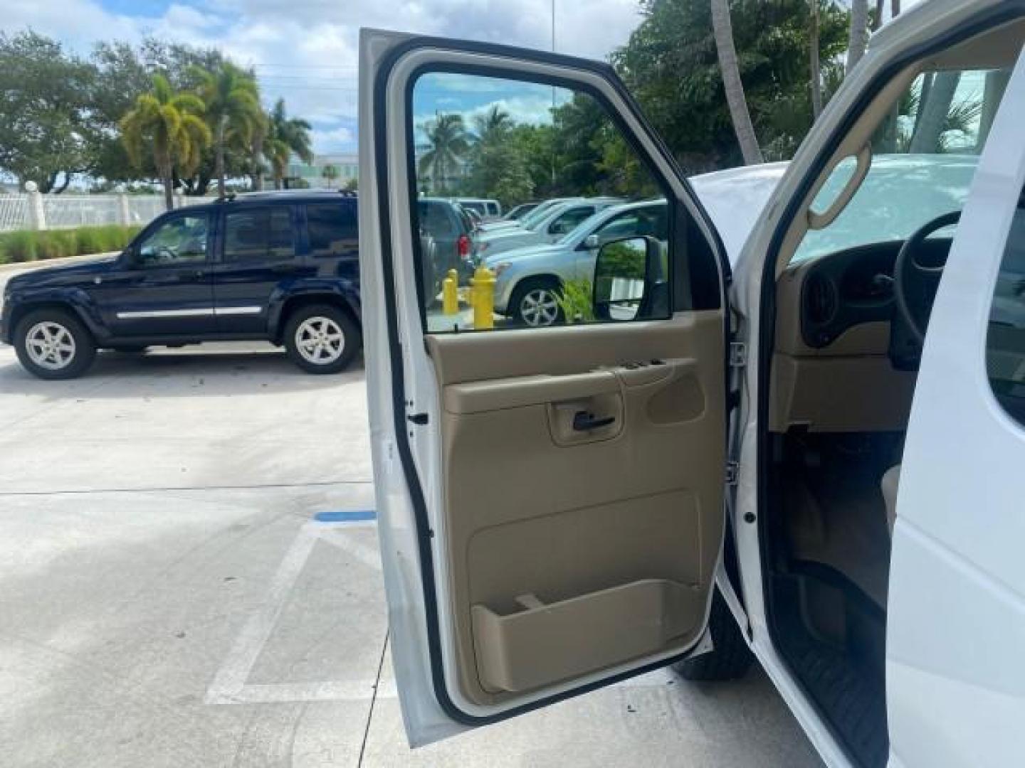 2006 Oxford White /Medium Flint Ford Econoline Wagon XLT LOW MILES 27,333 8 PASS (1FMRE11L86D) with an 5.4L EFI V8 Engine engine, Automatic transmission, located at 4701 North Dixie Hwy, Pompano Beach, FL, 33064, (954) 422-2889, 26.240938, -80.123474 - OUR WEBPAGE FLORIDACARS1.COM HAS OVER 100 PHOTOS AND FREE CARFAX LINK 2006 FORD E-SERIES E-150 XL - DUAL AIR 8 PASSENGER XL VIN: 1FMRE11L86DA99672 1 F M R E 1 1 L 8 6 D A 9 9 6 7 2 VAN 5.4L V8 F GASOLINE REAR WHEEL DRIVE Features ABS Brakes Air Conditioning AM/FM Stereo Automatic Transmission Runnin - Photo#9