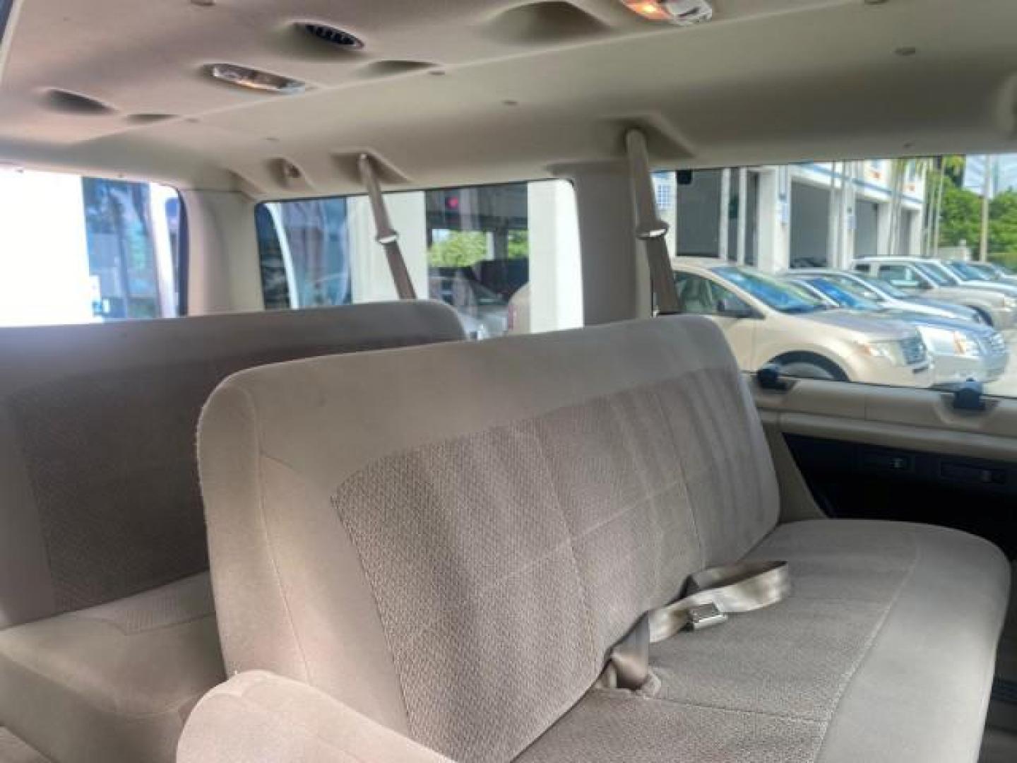2006 Oxford White /Medium Flint Ford Econoline Wagon XLT LOW MILES 27,333 8 PASS (1FMRE11L86D) with an 5.4L EFI V8 Engine engine, Automatic transmission, located at 4701 North Dixie Hwy, Pompano Beach, FL, 33064, (954) 422-2889, 26.240938, -80.123474 - OUR WEBPAGE FLORIDACARS1.COM HAS OVER 100 PHOTOS AND FREE CARFAX LINK 2006 FORD E-SERIES E-150 XL - DUAL AIR 8 PASSENGER XL VIN: 1FMRE11L86DA99672 1 F M R E 1 1 L 8 6 D A 9 9 6 7 2 VAN 5.4L V8 F GASOLINE REAR WHEEL DRIVE Features ABS Brakes Air Conditioning AM/FM Stereo Automatic Transmission Runnin - Photo#14