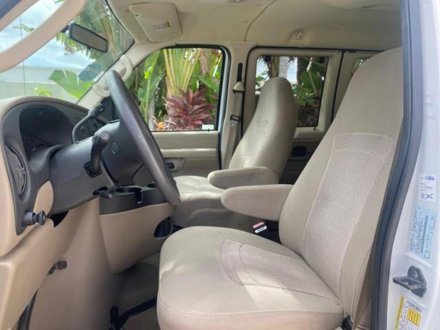 2006 Oxford White /Medium Flint Ford Econoline Wagon XLT LOW MILES 27,333 8 PASS (1FMRE11L86D) with an 5.4L EFI V8 Engine engine, Automatic transmission, located at 4701 North Dixie Hwy, Pompano Beach, FL, 33064, (954) 422-2889, 26.240938, -80.123474 - OUR WEBPAGE FLORIDACARS1.COM HAS OVER 100 PHOTOS AND FREE CARFAX LINK 2006 FORD E-SERIES E-150 XL - DUAL AIR 8 PASSENGER XL VIN: 1FMRE11L86DA99672 1 F M R E 1 1 L 8 6 D A 9 9 6 7 2 VAN 5.4L V8 F GASOLINE REAR WHEEL DRIVE Features ABS Brakes Air Conditioning AM/FM Stereo Automatic Transmission Runnin - Photo#32
