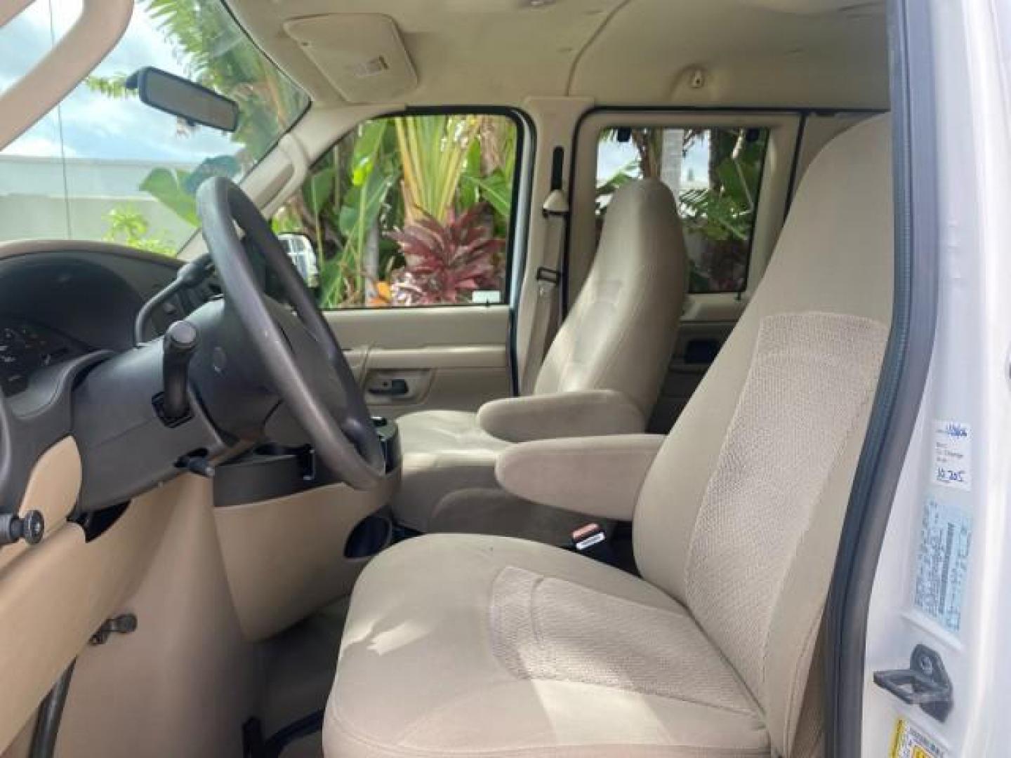 2006 Oxford White /Medium Flint Ford Econoline Wagon XLT LOW MILES 27,333 8 PASS (1FMRE11L86D) with an 5.4L EFI V8 Engine engine, Automatic transmission, located at 4701 North Dixie Hwy, Pompano Beach, FL, 33064, (954) 422-2889, 26.240938, -80.123474 - OUR WEBPAGE FLORIDACARS1.COM HAS OVER 100 PHOTOS AND FREE CARFAX LINK 2006 FORD E-SERIES E-150 XL - DUAL AIR 8 PASSENGER XL VIN: 1FMRE11L86DA99672 1 F M R E 1 1 L 8 6 D A 9 9 6 7 2 VAN 5.4L V8 F GASOLINE REAR WHEEL DRIVE Features ABS Brakes Air Conditioning AM/FM Stereo Automatic Transmission Runnin - Photo#33