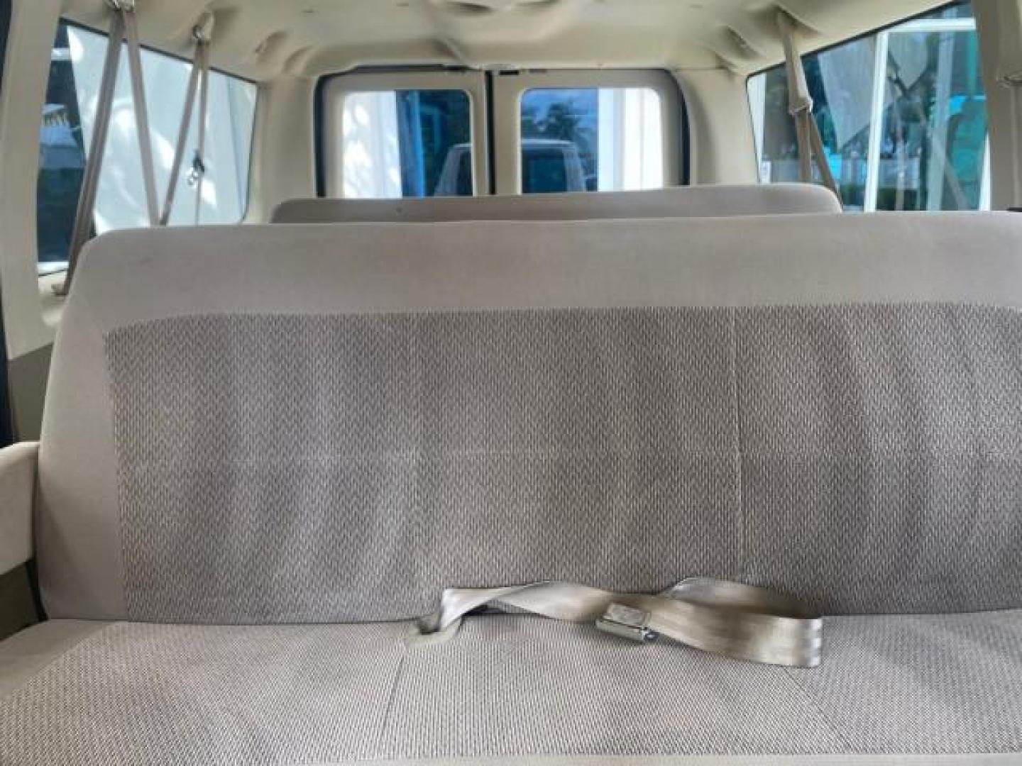 2006 Oxford White /Medium Flint Ford Econoline Wagon XLT LOW MILES 27,333 8 PASS (1FMRE11L86D) with an 5.4L EFI V8 Engine engine, Automatic transmission, located at 4701 North Dixie Hwy, Pompano Beach, FL, 33064, (954) 422-2889, 26.240938, -80.123474 - OUR WEBPAGE FLORIDACARS1.COM HAS OVER 100 PHOTOS AND FREE CARFAX LINK 2006 FORD E-SERIES E-150 XL - DUAL AIR 8 PASSENGER XL VIN: 1FMRE11L86DA99672 1 F M R E 1 1 L 8 6 D A 9 9 6 7 2 VAN 5.4L V8 F GASOLINE REAR WHEEL DRIVE Features ABS Brakes Air Conditioning AM/FM Stereo Automatic Transmission Runnin - Photo#60