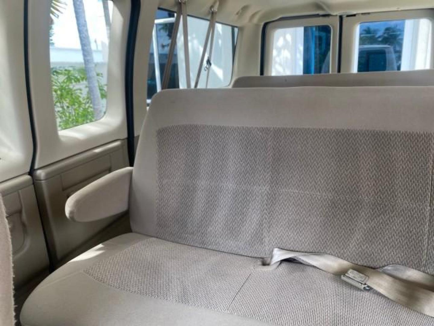 2006 Oxford White /Medium Flint Ford Econoline Wagon XLT LOW MILES 27,333 8 PASS (1FMRE11L86D) with an 5.4L EFI V8 Engine engine, Automatic transmission, located at 4701 North Dixie Hwy, Pompano Beach, FL, 33064, (954) 422-2889, 26.240938, -80.123474 - OUR WEBPAGE FLORIDACARS1.COM HAS OVER 100 PHOTOS AND FREE CARFAX LINK 2006 FORD E-SERIES E-150 XL - DUAL AIR 8 PASSENGER XL VIN: 1FMRE11L86DA99672 1 F M R E 1 1 L 8 6 D A 9 9 6 7 2 VAN 5.4L V8 F GASOLINE REAR WHEEL DRIVE Features ABS Brakes Air Conditioning AM/FM Stereo Automatic Transmission Runnin - Photo#61
