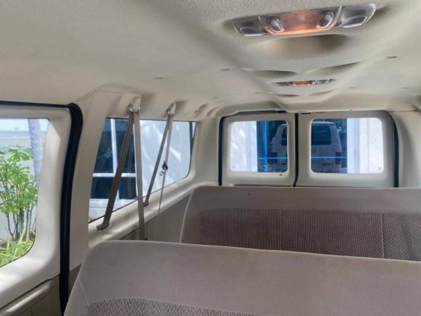 2006 Oxford White /Medium Flint Ford Econoline Wagon XLT LOW MILES 27,333 8 PASS (1FMRE11L86D) with an 5.4L EFI V8 Engine engine, Automatic transmission, located at 4701 North Dixie Hwy, Pompano Beach, FL, 33064, (954) 422-2889, 26.240938, -80.123474 - OUR WEBPAGE FLORIDACARS1.COM HAS OVER 100 PHOTOS AND FREE CARFAX LINK 2006 FORD E-SERIES E-150 XL - DUAL AIR 8 PASSENGER XL VIN: 1FMRE11L86DA99672 1 F M R E 1 1 L 8 6 D A 9 9 6 7 2 VAN 5.4L V8 F GASOLINE REAR WHEEL DRIVE Features ABS Brakes Air Conditioning AM/FM Stereo Automatic Transmission Runnin - Photo#62