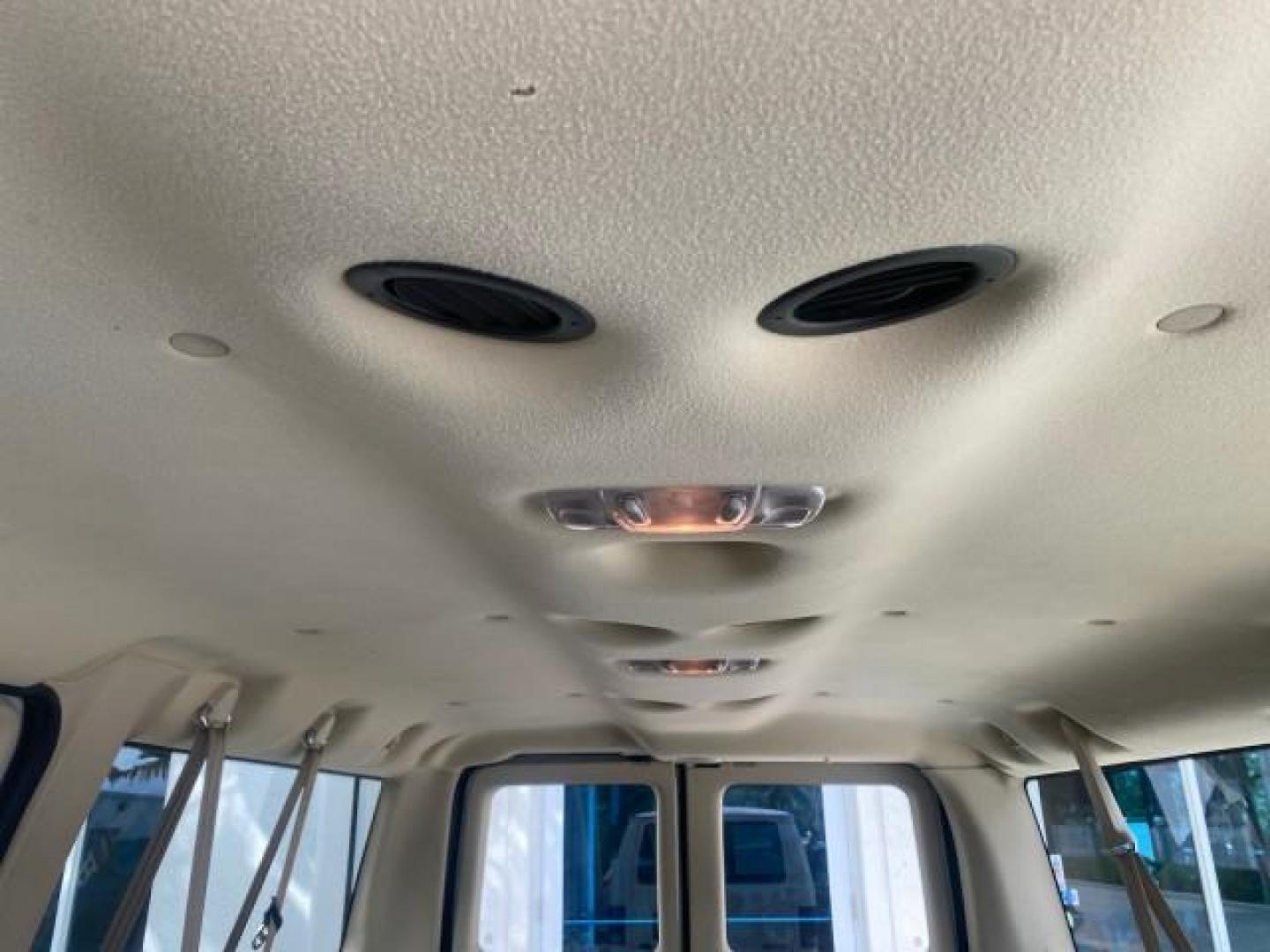 2006 Oxford White /Medium Flint Ford Econoline Wagon XLT LOW MILES 27,333 8 PASS (1FMRE11L86D) with an 5.4L EFI V8 Engine engine, Automatic transmission, located at 4701 North Dixie Hwy, Pompano Beach, FL, 33064, (954) 422-2889, 26.240938, -80.123474 - OUR WEBPAGE FLORIDACARS1.COM HAS OVER 100 PHOTOS AND FREE CARFAX LINK 2006 FORD E-SERIES E-150 XL - DUAL AIR 8 PASSENGER XL VIN: 1FMRE11L86DA99672 1 F M R E 1 1 L 8 6 D A 9 9 6 7 2 VAN 5.4L V8 F GASOLINE REAR WHEEL DRIVE Features ABS Brakes Air Conditioning AM/FM Stereo Automatic Transmission Runnin - Photo#63