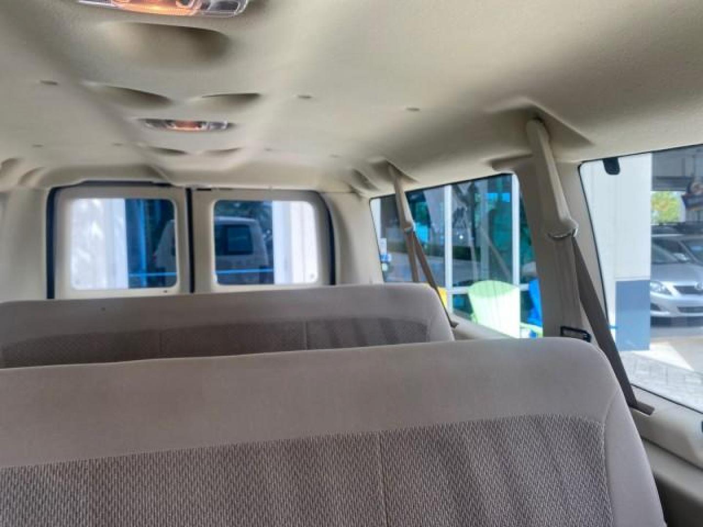 2006 Oxford White /Medium Flint Ford Econoline Wagon XLT LOW MILES 27,333 8 PASS (1FMRE11L86D) with an 5.4L EFI V8 Engine engine, Automatic transmission, located at 4701 North Dixie Hwy, Pompano Beach, FL, 33064, (954) 422-2889, 26.240938, -80.123474 - OUR WEBPAGE FLORIDACARS1.COM HAS OVER 100 PHOTOS AND FREE CARFAX LINK 2006 FORD E-SERIES E-150 XL - DUAL AIR 8 PASSENGER XL VIN: 1FMRE11L86DA99672 1 F M R E 1 1 L 8 6 D A 9 9 6 7 2 VAN 5.4L V8 F GASOLINE REAR WHEEL DRIVE Features ABS Brakes Air Conditioning AM/FM Stereo Automatic Transmission Runnin - Photo#64