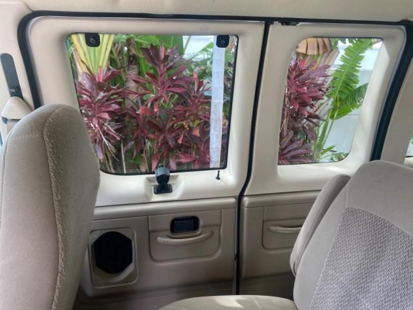 2006 Oxford White /Medium Flint Ford Econoline Wagon XLT LOW MILES 27,333 8 PASS (1FMRE11L86D) with an 5.4L EFI V8 Engine engine, Automatic transmission, located at 4701 North Dixie Hwy, Pompano Beach, FL, 33064, (954) 422-2889, 26.240938, -80.123474 - OUR WEBPAGE FLORIDACARS1.COM HAS OVER 100 PHOTOS AND FREE CARFAX LINK 2006 FORD E-SERIES E-150 XL - DUAL AIR 8 PASSENGER XL VIN: 1FMRE11L86DA99672 1 F M R E 1 1 L 8 6 D A 9 9 6 7 2 VAN 5.4L V8 F GASOLINE REAR WHEEL DRIVE Features ABS Brakes Air Conditioning AM/FM Stereo Automatic Transmission Runnin - Photo#65