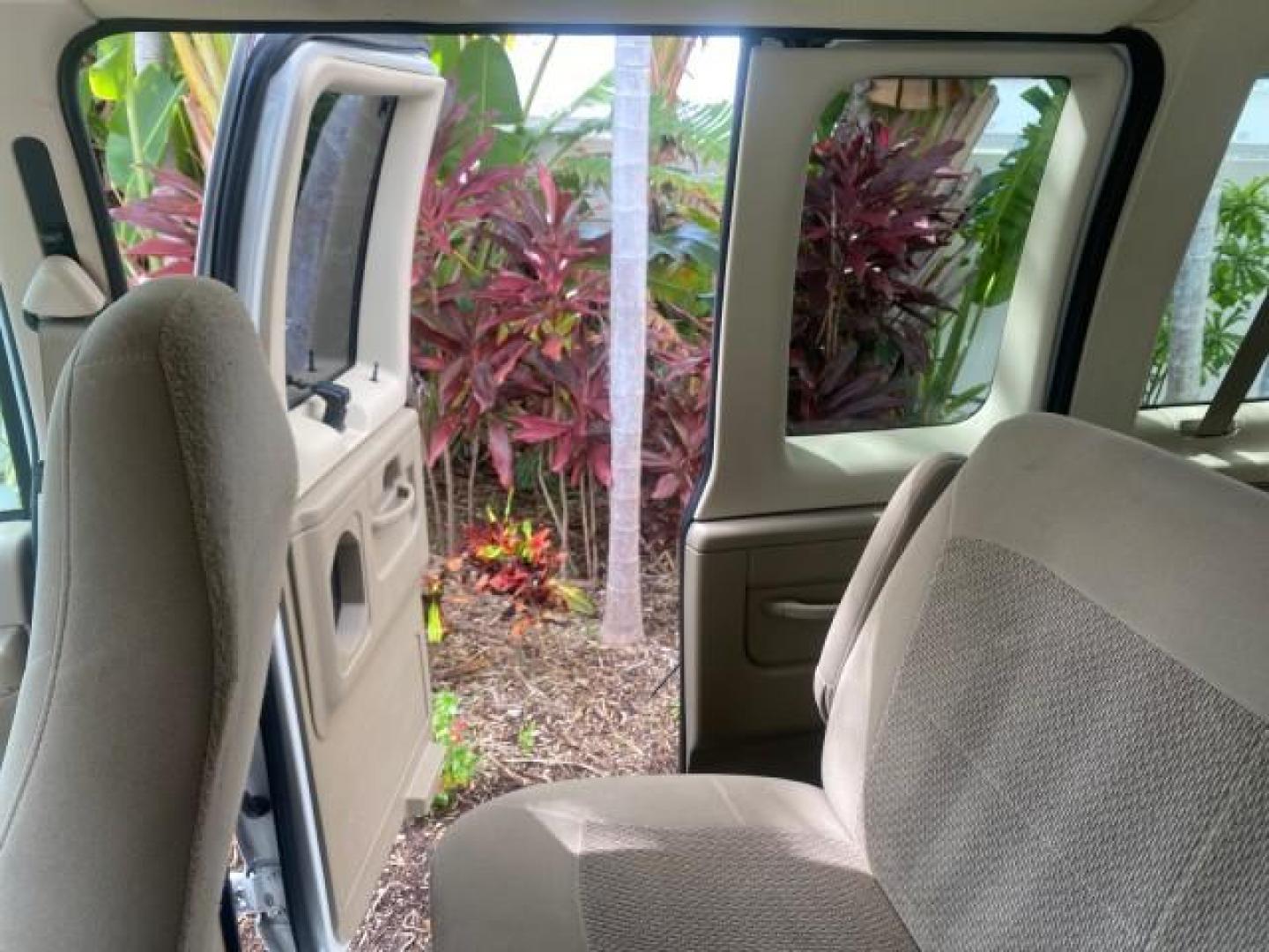 2006 Oxford White /Medium Flint Ford Econoline Wagon XLT LOW MILES 27,333 8 PASS (1FMRE11L86D) with an 5.4L EFI V8 Engine engine, Automatic transmission, located at 4701 North Dixie Hwy, Pompano Beach, FL, 33064, (954) 422-2889, 26.240938, -80.123474 - OUR WEBPAGE FLORIDACARS1.COM HAS OVER 100 PHOTOS AND FREE CARFAX LINK 2006 FORD E-SERIES E-150 XL - DUAL AIR 8 PASSENGER XL VIN: 1FMRE11L86DA99672 1 F M R E 1 1 L 8 6 D A 9 9 6 7 2 VAN 5.4L V8 F GASOLINE REAR WHEEL DRIVE Features ABS Brakes Air Conditioning AM/FM Stereo Automatic Transmission Runnin - Photo#66