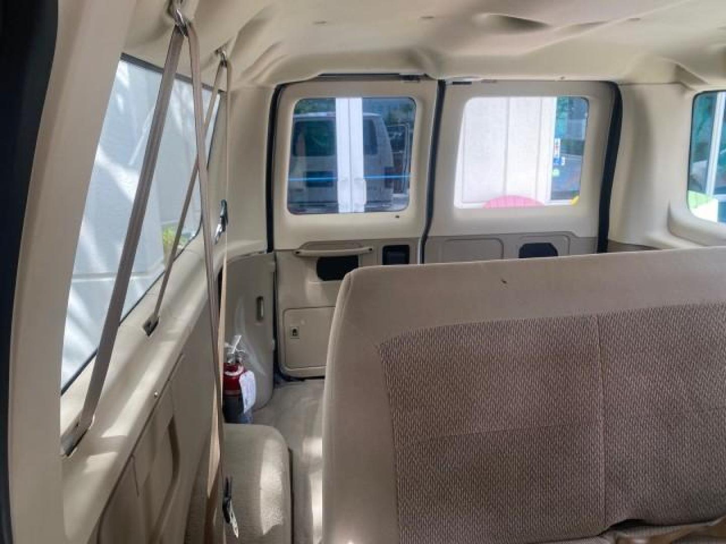 2006 Oxford White /Medium Flint Ford Econoline Wagon XLT LOW MILES 27,333 8 PASS (1FMRE11L86D) with an 5.4L EFI V8 Engine engine, Automatic transmission, located at 4701 North Dixie Hwy, Pompano Beach, FL, 33064, (954) 422-2889, 26.240938, -80.123474 - OUR WEBPAGE FLORIDACARS1.COM HAS OVER 100 PHOTOS AND FREE CARFAX LINK 2006 FORD E-SERIES E-150 XL - DUAL AIR 8 PASSENGER XL VIN: 1FMRE11L86DA99672 1 F M R E 1 1 L 8 6 D A 9 9 6 7 2 VAN 5.4L V8 F GASOLINE REAR WHEEL DRIVE Features ABS Brakes Air Conditioning AM/FM Stereo Automatic Transmission Runnin - Photo#67