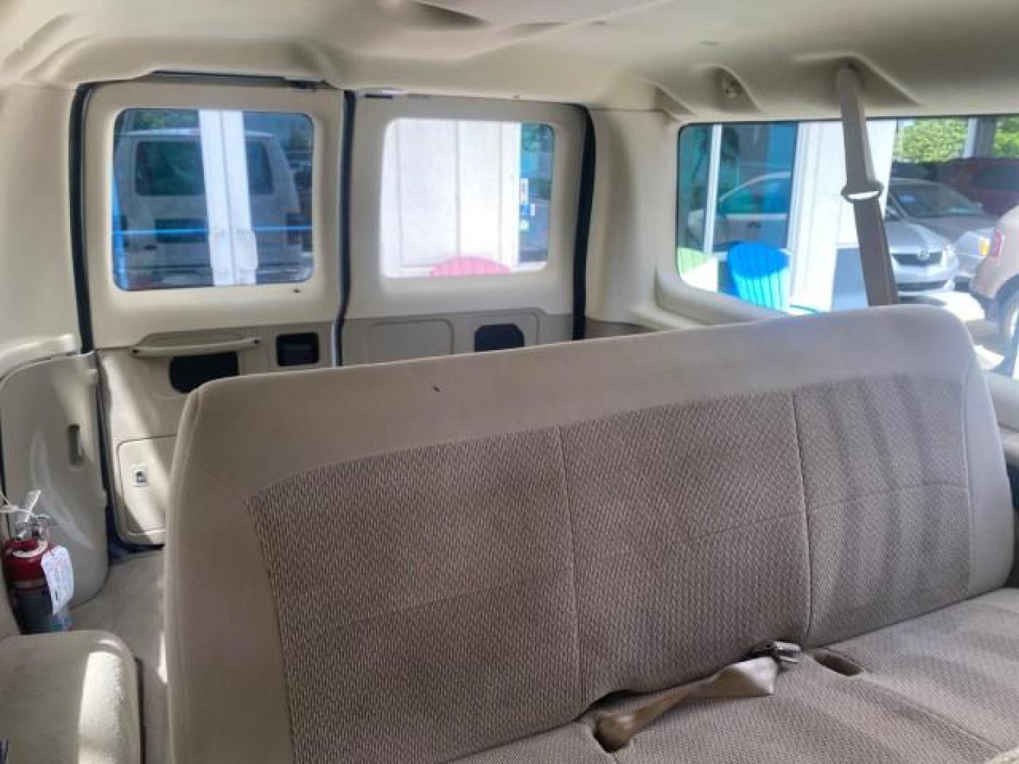 2006 Oxford White /Medium Flint Ford Econoline Wagon XLT LOW MILES 27,333 8 PASS (1FMRE11L86D) with an 5.4L EFI V8 Engine engine, Automatic transmission, located at 4701 North Dixie Hwy, Pompano Beach, FL, 33064, (954) 422-2889, 26.240938, -80.123474 - OUR WEBPAGE FLORIDACARS1.COM HAS OVER 100 PHOTOS AND FREE CARFAX LINK 2006 FORD E-SERIES E-150 XL - DUAL AIR 8 PASSENGER XL VIN: 1FMRE11L86DA99672 1 F M R E 1 1 L 8 6 D A 9 9 6 7 2 VAN 5.4L V8 F GASOLINE REAR WHEEL DRIVE Features ABS Brakes Air Conditioning AM/FM Stereo Automatic Transmission Runnin - Photo#68
