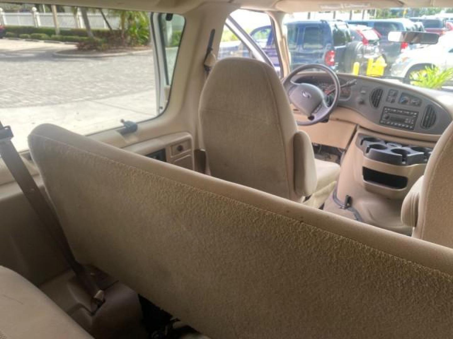 2006 Oxford White /Medium Flint Ford Econoline Wagon XLT LOW MILES 27,333 8 PASS (1FMRE11L86D) with an 5.4L EFI V8 Engine engine, Automatic transmission, located at 4701 North Dixie Hwy, Pompano Beach, FL, 33064, (954) 422-2889, 26.240938, -80.123474 - OUR WEBPAGE FLORIDACARS1.COM HAS OVER 100 PHOTOS AND FREE CARFAX LINK 2006 FORD E-SERIES E-150 XL - DUAL AIR 8 PASSENGER XL VIN: 1FMRE11L86DA99672 1 F M R E 1 1 L 8 6 D A 9 9 6 7 2 VAN 5.4L V8 F GASOLINE REAR WHEEL DRIVE Features ABS Brakes Air Conditioning AM/FM Stereo Automatic Transmission Runnin - Photo#70