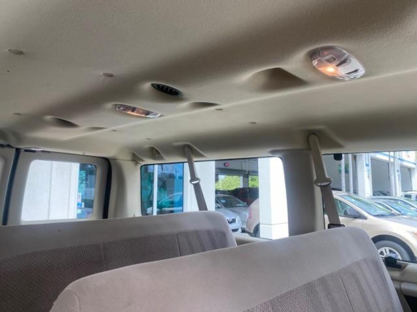 2006 Oxford White /Medium Flint Ford Econoline Wagon XLT LOW MILES 27,333 8 PASS (1FMRE11L86D) with an 5.4L EFI V8 Engine engine, Automatic transmission, located at 4701 North Dixie Hwy, Pompano Beach, FL, 33064, (954) 422-2889, 26.240938, -80.123474 - OUR WEBPAGE FLORIDACARS1.COM HAS OVER 100 PHOTOS AND FREE CARFAX LINK 2006 FORD E-SERIES E-150 XL - DUAL AIR 8 PASSENGER XL VIN: 1FMRE11L86DA99672 1 F M R E 1 1 L 8 6 D A 9 9 6 7 2 VAN 5.4L V8 F GASOLINE REAR WHEEL DRIVE Features ABS Brakes Air Conditioning AM/FM Stereo Automatic Transmission Runnin - Photo#77