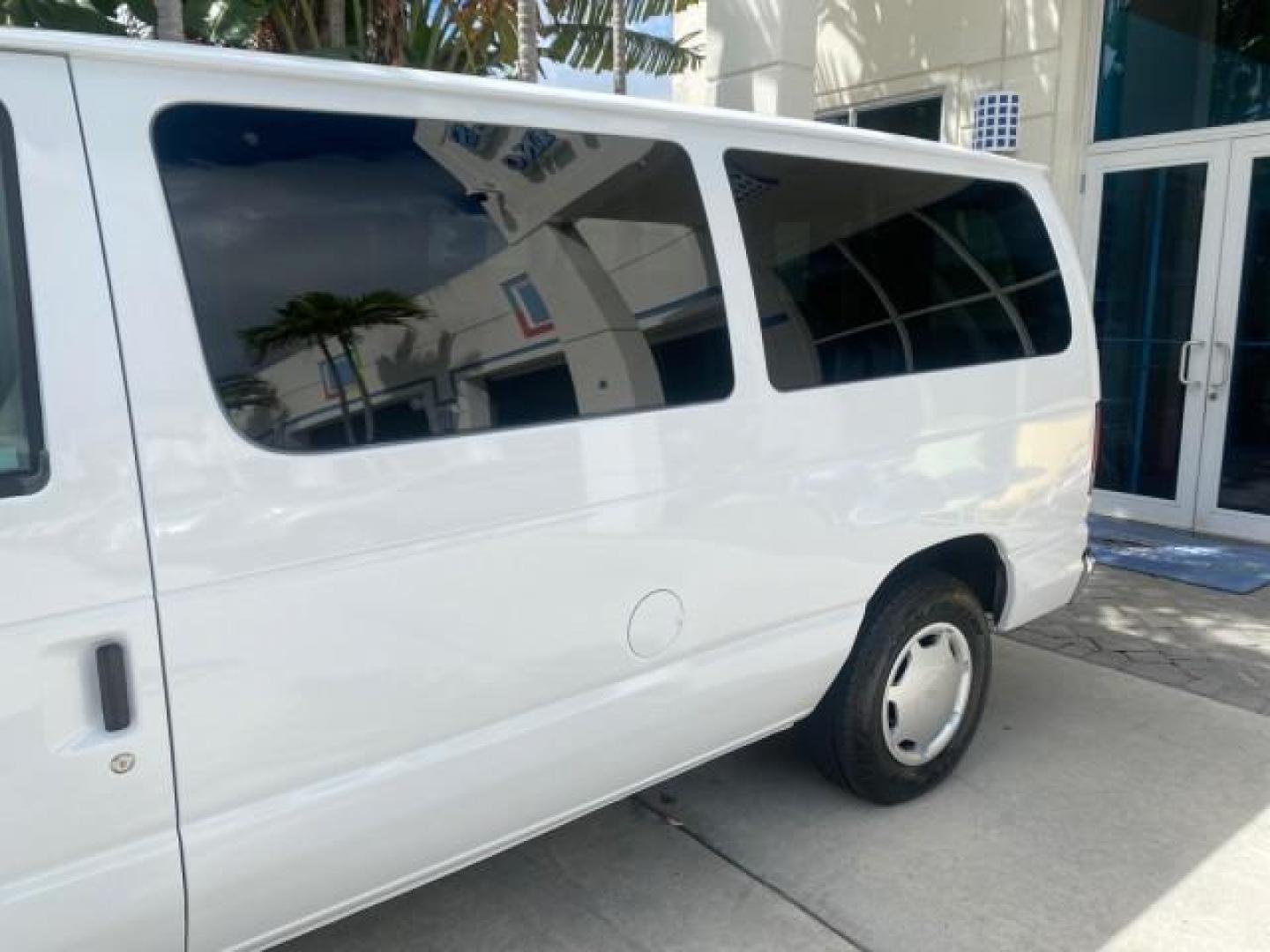 2006 Oxford White /Medium Flint Ford Econoline Wagon XLT LOW MILES 27,333 8 PASS (1FMRE11L86D) with an 5.4L EFI V8 Engine engine, Automatic transmission, located at 4701 North Dixie Hwy, Pompano Beach, FL, 33064, (954) 422-2889, 26.240938, -80.123474 - OUR WEBPAGE FLORIDACARS1.COM HAS OVER 100 PHOTOS AND FREE CARFAX LINK 2006 FORD E-SERIES E-150 XL - DUAL AIR 8 PASSENGER XL VIN: 1FMRE11L86DA99672 1 F M R E 1 1 L 8 6 D A 9 9 6 7 2 VAN 5.4L V8 F GASOLINE REAR WHEEL DRIVE Features ABS Brakes Air Conditioning AM/FM Stereo Automatic Transmission Runnin - Photo#78