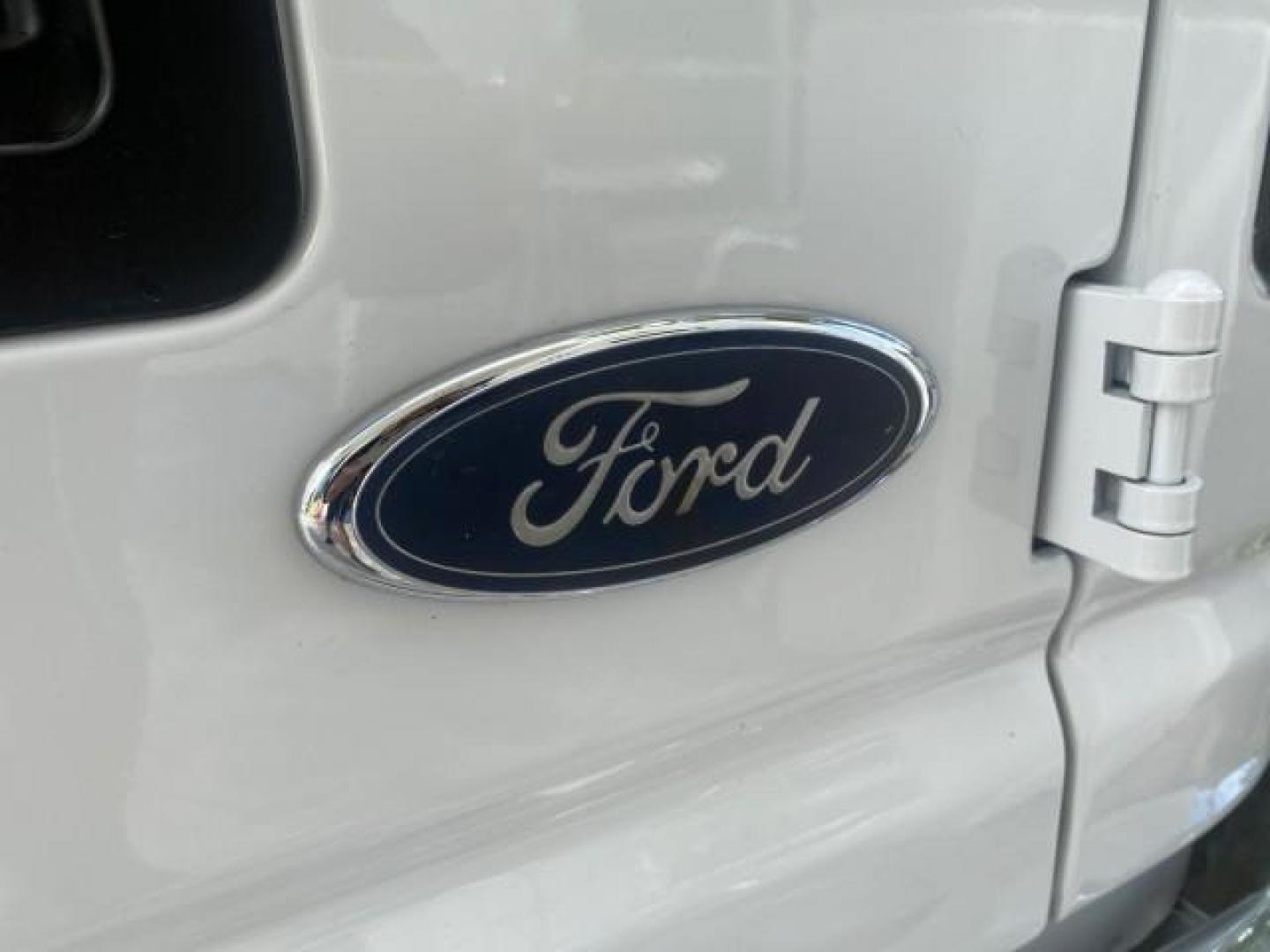 2006 Oxford White /Medium Flint Ford Econoline Wagon XLT LOW MILES 27,333 8 PASS (1FMRE11L86D) with an 5.4L EFI V8 Engine engine, Automatic transmission, located at 4701 North Dixie Hwy, Pompano Beach, FL, 33064, (954) 422-2889, 26.240938, -80.123474 - OUR WEBPAGE FLORIDACARS1.COM HAS OVER 100 PHOTOS AND FREE CARFAX LINK 2006 FORD E-SERIES E-150 XL - DUAL AIR 8 PASSENGER XL VIN: 1FMRE11L86DA99672 1 F M R E 1 1 L 8 6 D A 9 9 6 7 2 VAN 5.4L V8 F GASOLINE REAR WHEEL DRIVE Features ABS Brakes Air Conditioning AM/FM Stereo Automatic Transmission Runnin - Photo#87