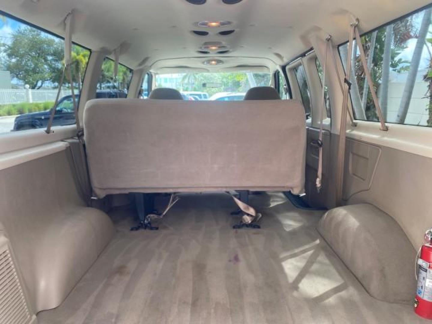 2006 Oxford White /Medium Flint Ford Econoline Wagon XLT LOW MILES 27,333 8 PASS (1FMRE11L86D) with an 5.4L EFI V8 Engine engine, Automatic transmission, located at 4701 North Dixie Hwy, Pompano Beach, FL, 33064, (954) 422-2889, 26.240938, -80.123474 - OUR WEBPAGE FLORIDACARS1.COM HAS OVER 100 PHOTOS AND FREE CARFAX LINK 2006 FORD E-SERIES E-150 XL - DUAL AIR 8 PASSENGER XL VIN: 1FMRE11L86DA99672 1 F M R E 1 1 L 8 6 D A 9 9 6 7 2 VAN 5.4L V8 F GASOLINE REAR WHEEL DRIVE Features ABS Brakes Air Conditioning AM/FM Stereo Automatic Transmission Runnin - Photo#91