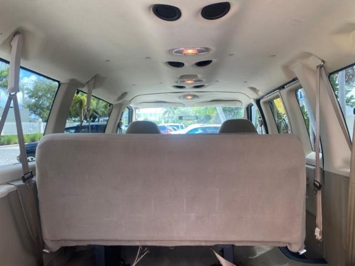 2006 Oxford White /Medium Flint Ford Econoline Wagon XLT LOW MILES 27,333 8 PASS (1FMRE11L86D) with an 5.4L EFI V8 Engine engine, Automatic transmission, located at 4701 North Dixie Hwy, Pompano Beach, FL, 33064, (954) 422-2889, 26.240938, -80.123474 - OUR WEBPAGE FLORIDACARS1.COM HAS OVER 100 PHOTOS AND FREE CARFAX LINK 2006 FORD E-SERIES E-150 XL - DUAL AIR 8 PASSENGER XL VIN: 1FMRE11L86DA99672 1 F M R E 1 1 L 8 6 D A 9 9 6 7 2 VAN 5.4L V8 F GASOLINE REAR WHEEL DRIVE Features ABS Brakes Air Conditioning AM/FM Stereo Automatic Transmission Runnin - Photo#92
