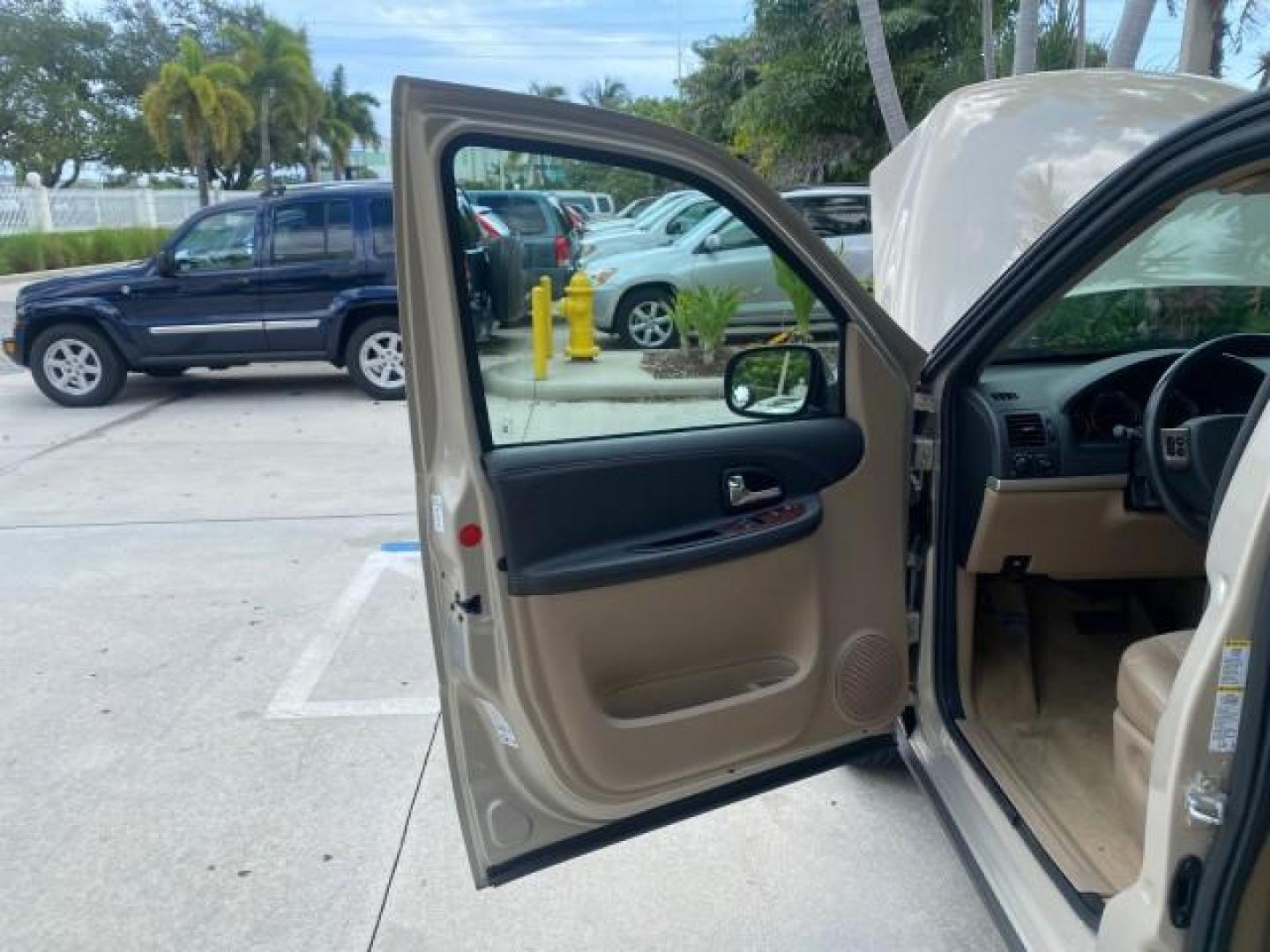 2007 Gold Mist Metallic /Cashmere Chevrolet Uplander LT LOW MILES 56,861 (1GNDV33197D) with an 3.9L V6 SFI Engine engine, Automatic transmission, located at 4701 North Dixie Hwy, Pompano Beach, FL, 33064, (954) 422-2889, 26.240938, -80.123474 - OUR WEBPAGE FLORIDACARS1.COM HAS OVER 100 PHOTOS AND FREE CARFAX LINK 2007 CHEVROLET UPLANDER LT VIN: 1GNDV33197D148165 1 G N D V 3 3 1 9 7 D 1 4 8 1 6 5 VAN 3.9L V6 F GASOLINE FRONT WHEEL DRIVE Features ABS Brakes Air Conditioning Alloy Wheels AM/FM Stereo Automatic Transmission CD Audio Cruise Con - Photo#9