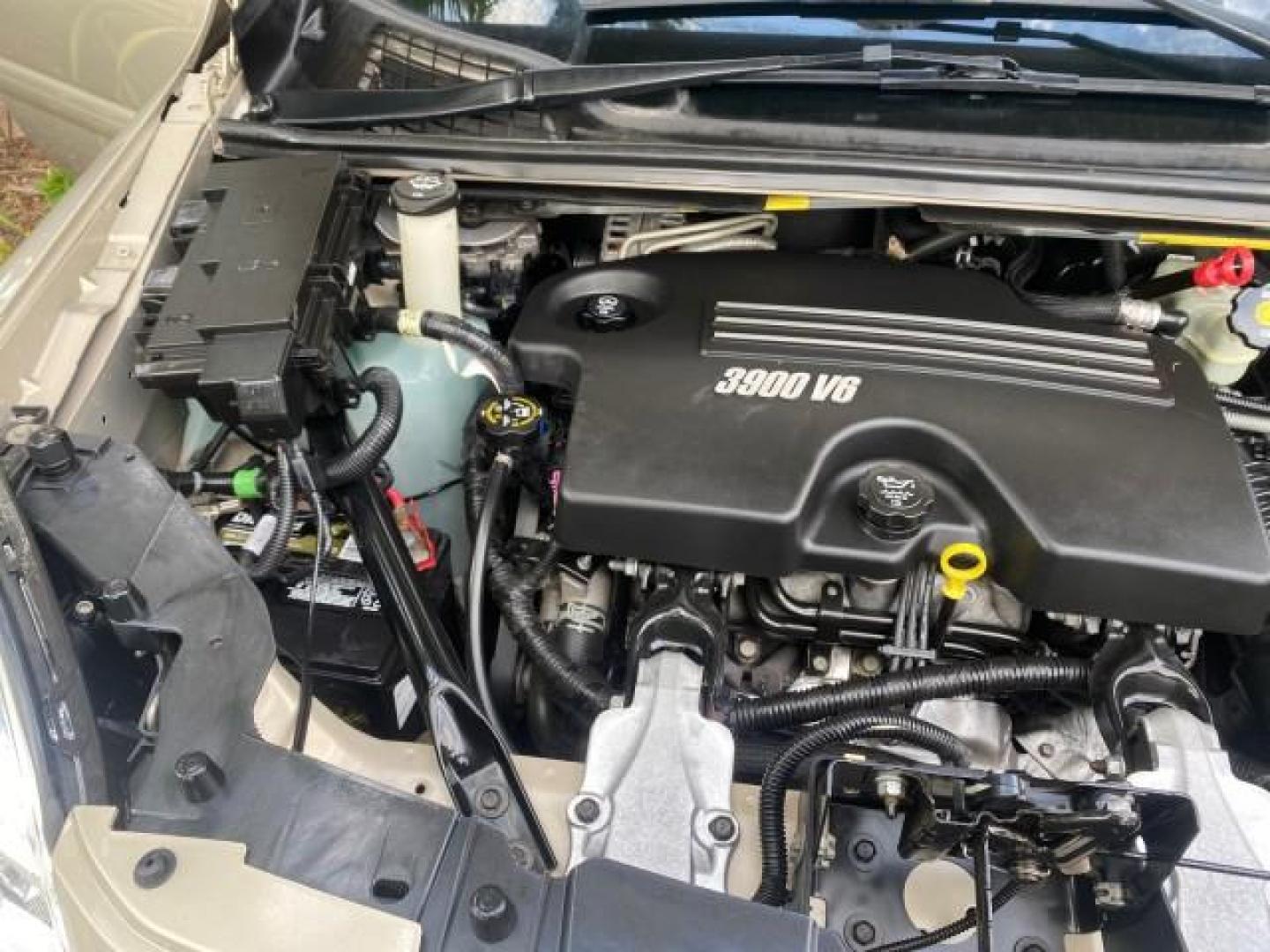 2007 Gold Mist Metallic /Cashmere Chevrolet Uplander LT LOW MILES 56,861 (1GNDV33197D) with an 3.9L V6 SFI Engine engine, Automatic transmission, located at 4701 North Dixie Hwy, Pompano Beach, FL, 33064, (954) 422-2889, 26.240938, -80.123474 - OUR WEBPAGE FLORIDACARS1.COM HAS OVER 100 PHOTOS AND FREE CARFAX LINK 2007 CHEVROLET UPLANDER LT VIN: 1GNDV33197D148165 1 G N D V 3 3 1 9 7 D 1 4 8 1 6 5 VAN 3.9L V6 F GASOLINE FRONT WHEEL DRIVE Features ABS Brakes Air Conditioning Alloy Wheels AM/FM Stereo Automatic Transmission CD Audio Cruise Con - Photo#25