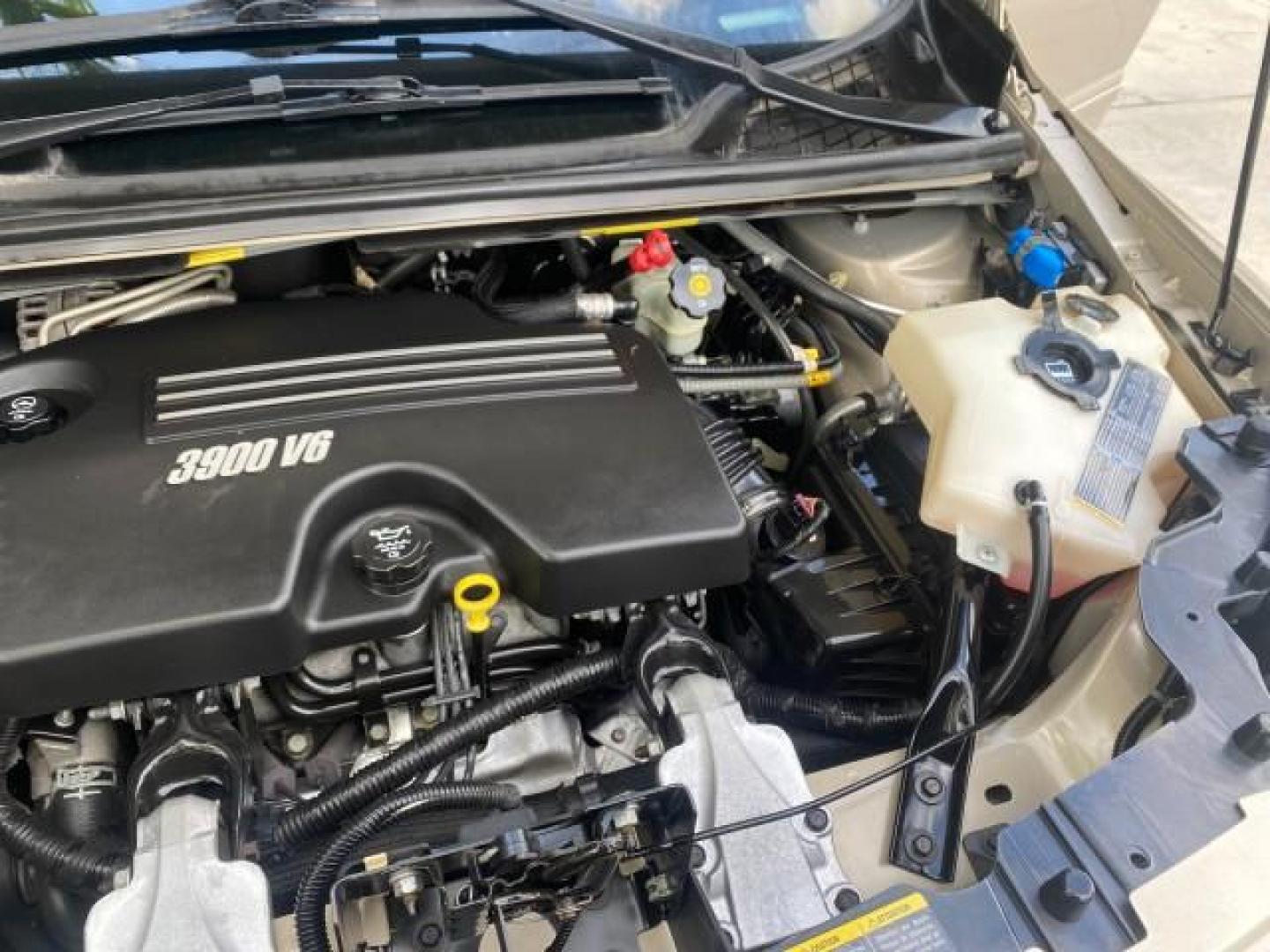 2007 Gold Mist Metallic /Cashmere Chevrolet Uplander LT LOW MILES 56,861 (1GNDV33197D) with an 3.9L V6 SFI Engine engine, Automatic transmission, located at 4701 North Dixie Hwy, Pompano Beach, FL, 33064, (954) 422-2889, 26.240938, -80.123474 - OUR WEBPAGE FLORIDACARS1.COM HAS OVER 100 PHOTOS AND FREE CARFAX LINK 2007 CHEVROLET UPLANDER LT VIN: 1GNDV33197D148165 1 G N D V 3 3 1 9 7 D 1 4 8 1 6 5 VAN 3.9L V6 F GASOLINE FRONT WHEEL DRIVE Features ABS Brakes Air Conditioning Alloy Wheels AM/FM Stereo Automatic Transmission CD Audio Cruise Con - Photo#26