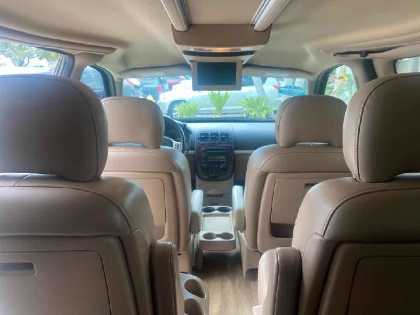 2007 Gold Mist Metallic /Cashmere Chevrolet Uplander LT LOW MILES 56,861 (1GNDV33197D) with an 3.9L V6 SFI Engine engine, Automatic transmission, located at 4701 North Dixie Hwy, Pompano Beach, FL, 33064, (954) 422-2889, 26.240938, -80.123474 - OUR WEBPAGE FLORIDACARS1.COM HAS OVER 100 PHOTOS AND FREE CARFAX LINK 2007 CHEVROLET UPLANDER LT VIN: 1GNDV33197D148165 1 G N D V 3 3 1 9 7 D 1 4 8 1 6 5 VAN 3.9L V6 F GASOLINE FRONT WHEEL DRIVE Features ABS Brakes Air Conditioning Alloy Wheels AM/FM Stereo Automatic Transmission CD Audio Cruise Con - Photo#68