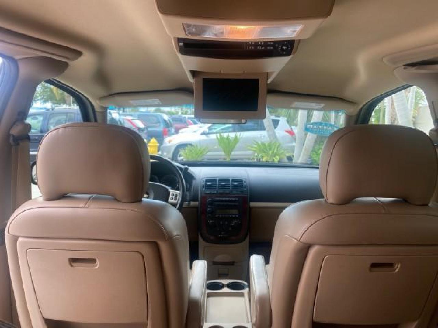 2007 Gold Mist Metallic /Cashmere Chevrolet Uplander LT LOW MILES 56,861 (1GNDV33197D) with an 3.9L V6 SFI Engine engine, Automatic transmission, located at 4701 North Dixie Hwy, Pompano Beach, FL, 33064, (954) 422-2889, 26.240938, -80.123474 - OUR WEBPAGE FLORIDACARS1.COM HAS OVER 100 PHOTOS AND FREE CARFAX LINK 2007 CHEVROLET UPLANDER LT VIN: 1GNDV33197D148165 1 G N D V 3 3 1 9 7 D 1 4 8 1 6 5 VAN 3.9L V6 F GASOLINE FRONT WHEEL DRIVE Features ABS Brakes Air Conditioning Alloy Wheels AM/FM Stereo Automatic Transmission CD Audio Cruise Con - Photo#69