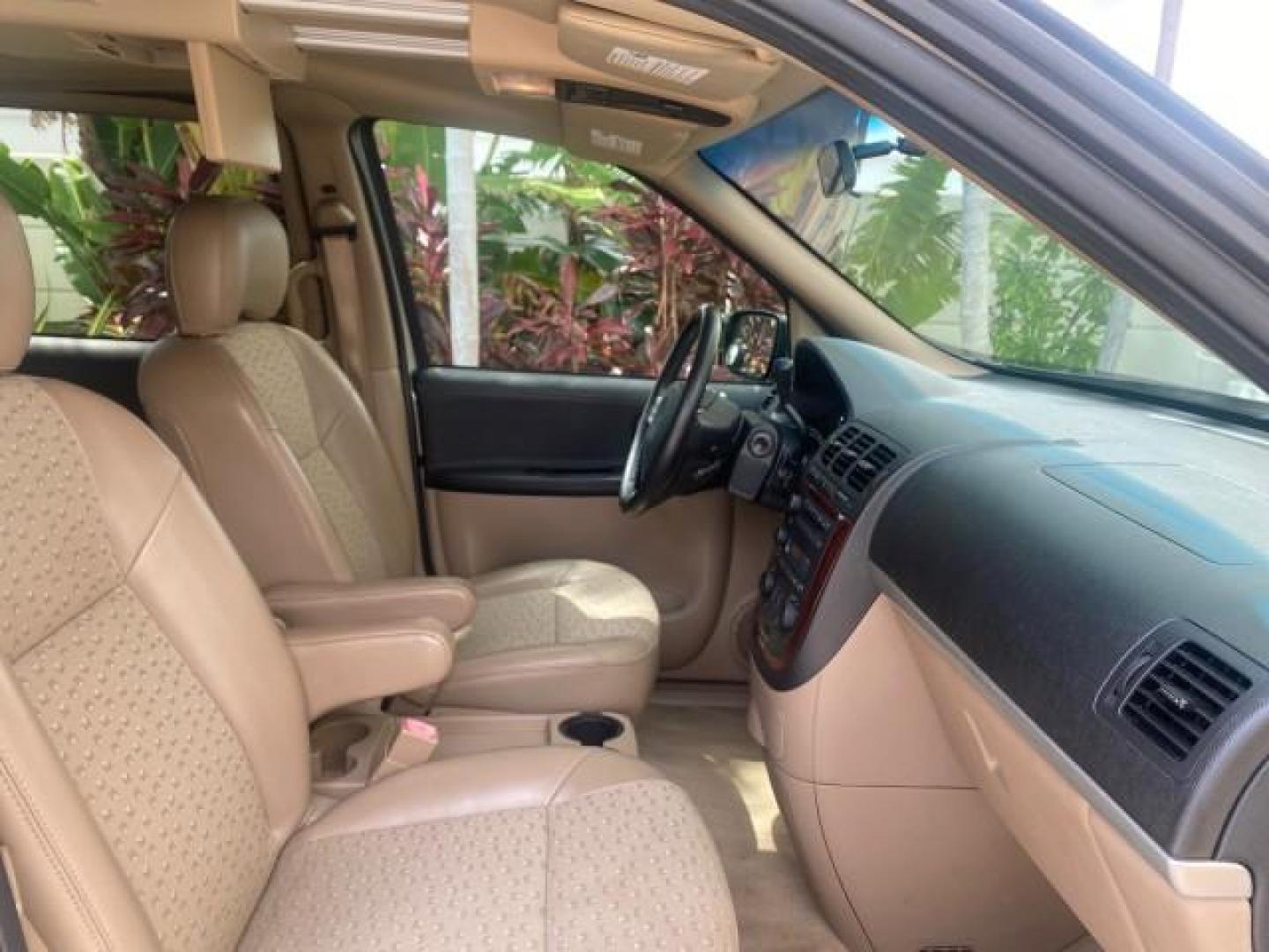 2007 Gold Mist Metallic /Cashmere Chevrolet Uplander LT LOW MILES 56,861 (1GNDV33197D) with an 3.9L V6 SFI Engine engine, Automatic transmission, located at 4701 North Dixie Hwy, Pompano Beach, FL, 33064, (954) 422-2889, 26.240938, -80.123474 - OUR WEBPAGE FLORIDACARS1.COM HAS OVER 100 PHOTOS AND FREE CARFAX LINK 2007 CHEVROLET UPLANDER LT VIN: 1GNDV33197D148165 1 G N D V 3 3 1 9 7 D 1 4 8 1 6 5 VAN 3.9L V6 F GASOLINE FRONT WHEEL DRIVE Features ABS Brakes Air Conditioning Alloy Wheels AM/FM Stereo Automatic Transmission CD Audio Cruise Con - Photo#96