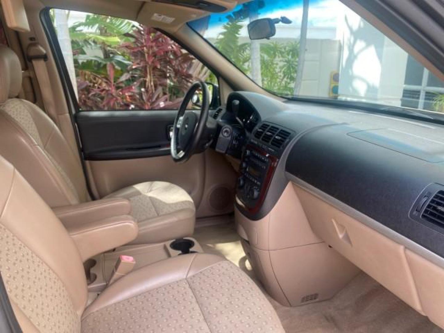 2007 Gold Mist Metallic /Cashmere Chevrolet Uplander LT LOW MILES 56,861 (1GNDV33197D) with an 3.9L V6 SFI Engine engine, Automatic transmission, located at 4701 North Dixie Hwy, Pompano Beach, FL, 33064, (954) 422-2889, 26.240938, -80.123474 - OUR WEBPAGE FLORIDACARS1.COM HAS OVER 100 PHOTOS AND FREE CARFAX LINK 2007 CHEVROLET UPLANDER LT VIN: 1GNDV33197D148165 1 G N D V 3 3 1 9 7 D 1 4 8 1 6 5 VAN 3.9L V6 F GASOLINE FRONT WHEEL DRIVE Features ABS Brakes Air Conditioning Alloy Wheels AM/FM Stereo Automatic Transmission CD Audio Cruise Con - Photo#97